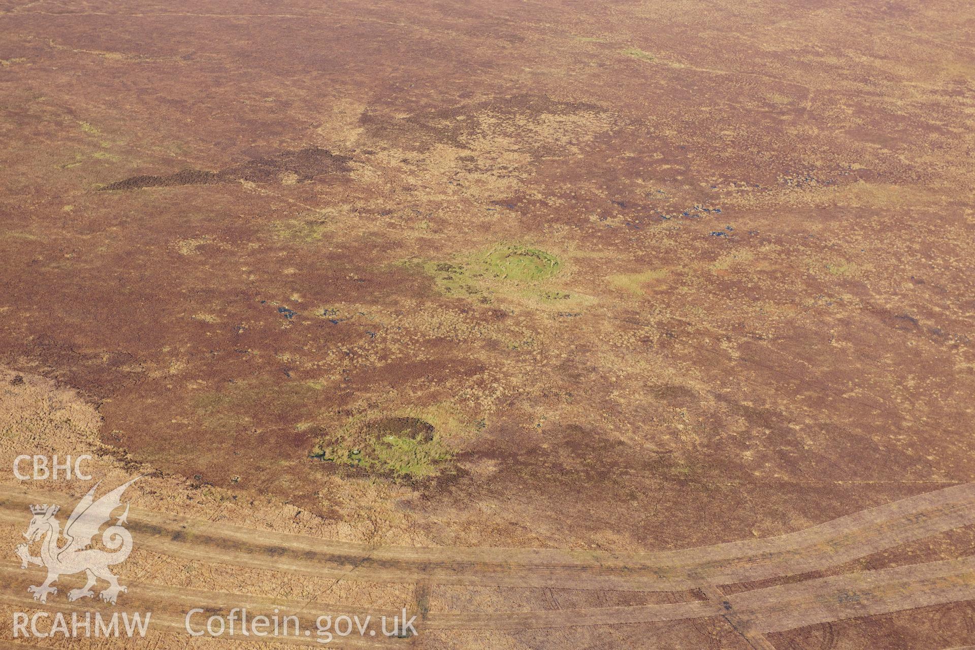 RCAHMW colour oblique photograph of Crugiau Giar, round barrows. Taken by Toby Driver on 05/11/2012.