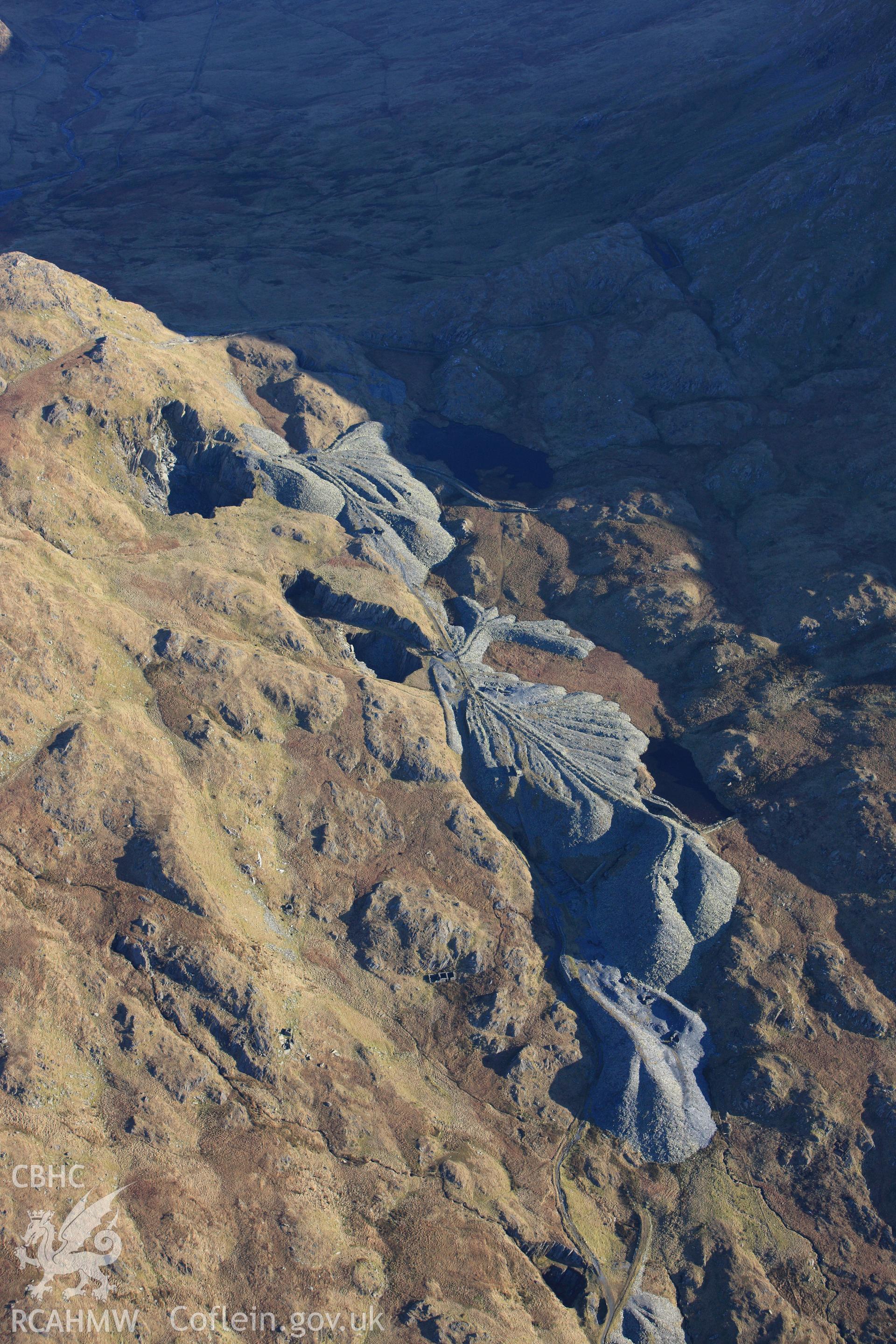 RCAHMW colour oblique photograph of Bwlch Cwmllan slate quarry, in low winter light. Taken by Toby Driver on 10/12/2012.