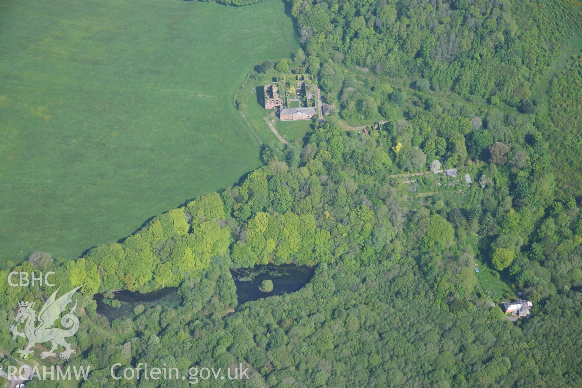 RCAHMW colour oblique photograph of General view of Iscoed park, gardens and house, looking north. Taken by Toby Driver on 24/05/2012.