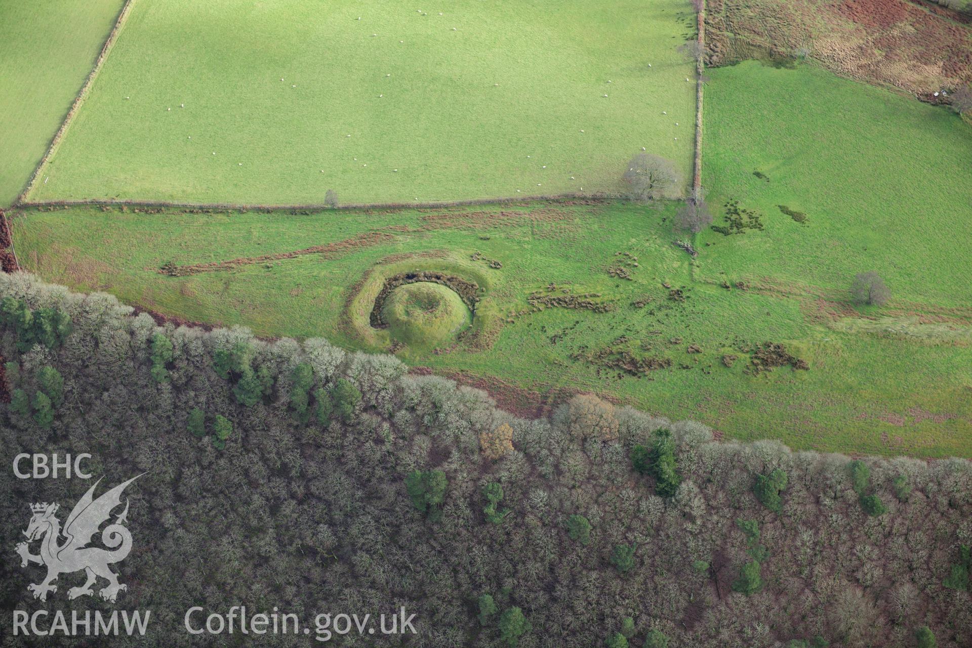 RCAHMW colour oblique photograph of Twdin mound  with possible house platform visible above. Taken by Toby Driver on 23/11/2012.