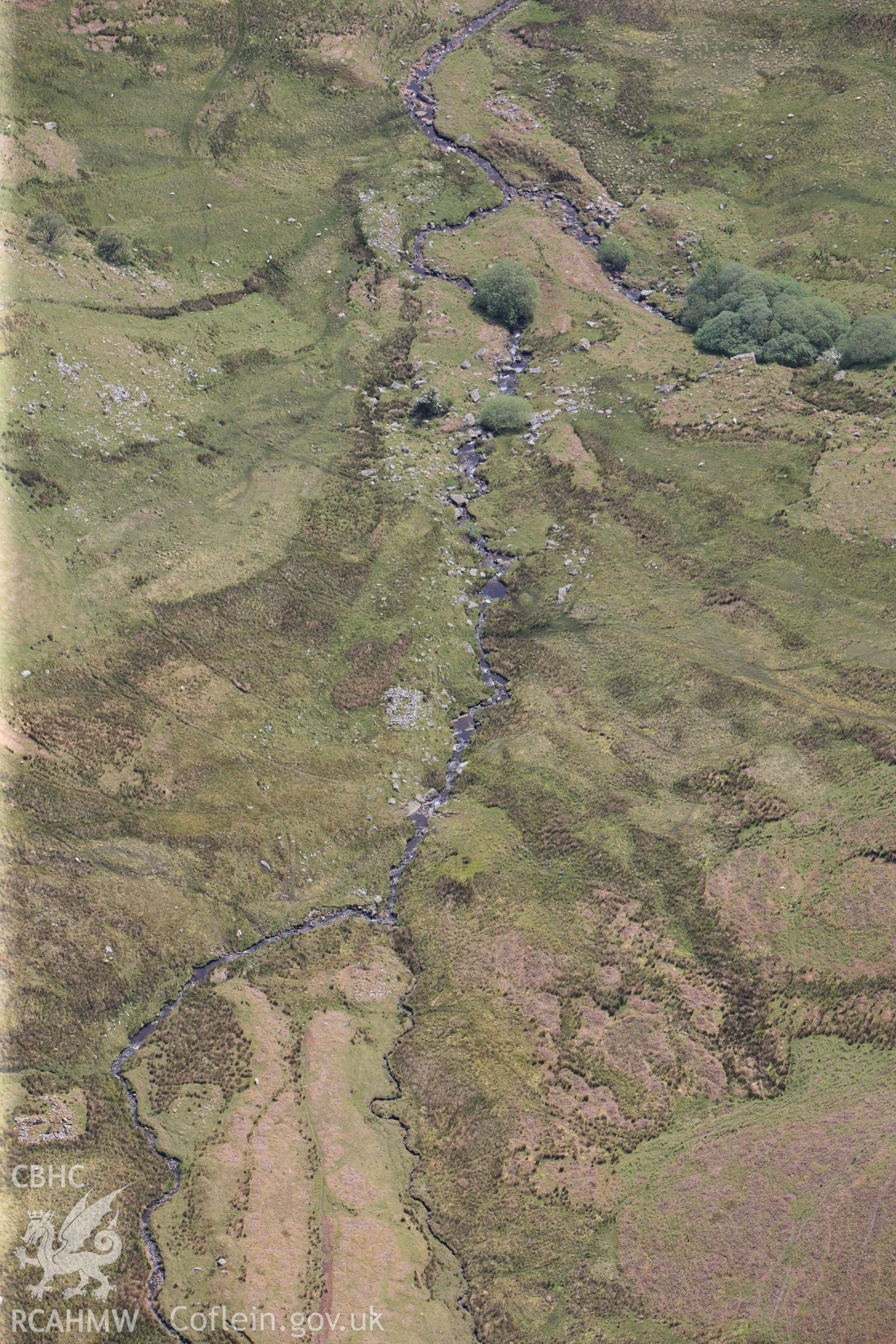 RCAHMW colour oblique photograph of Hafotau Settlement Bryn Melys. Taken by Toby Driver on 28/05/2012.