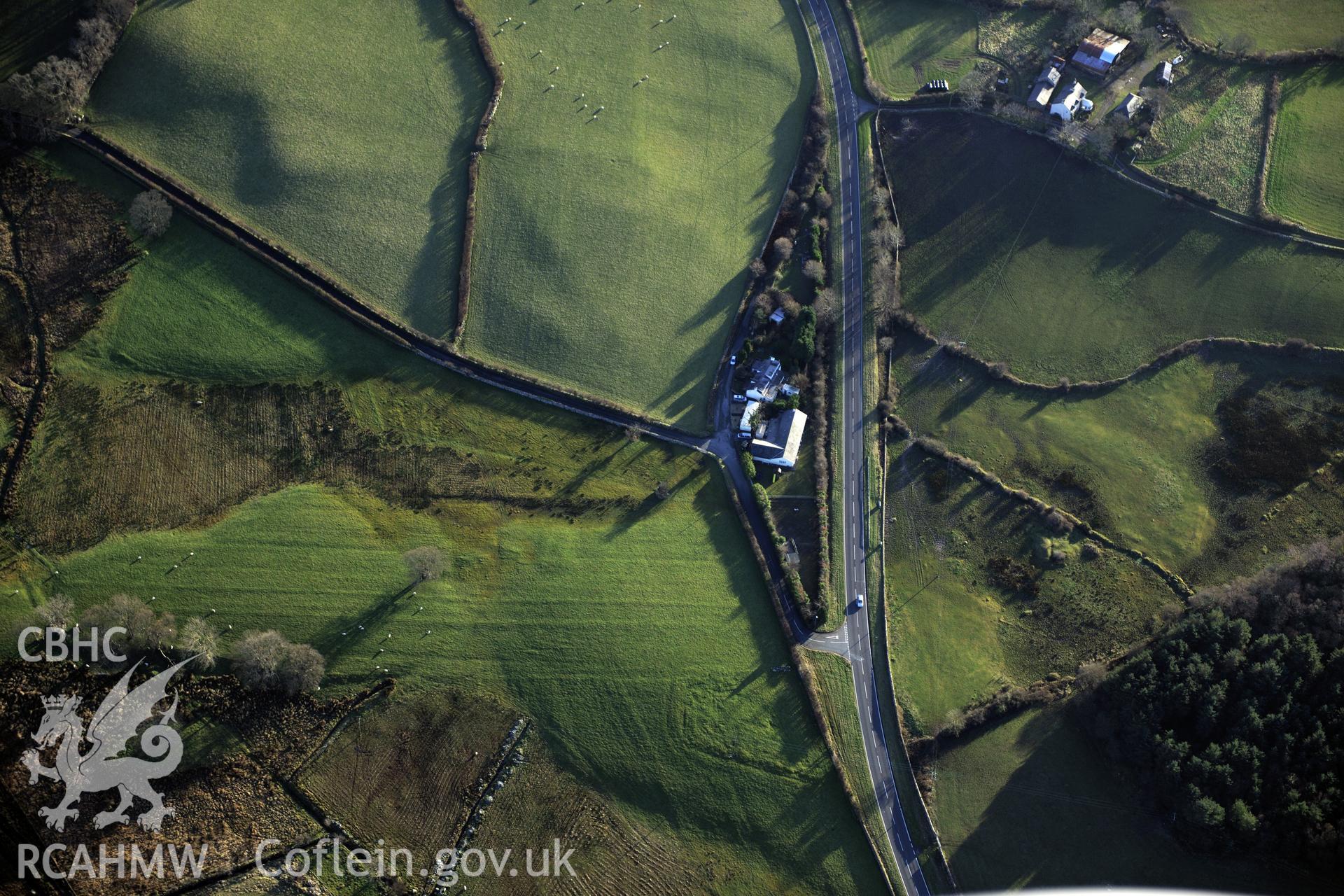 RCAHMW colour oblique photograph of Efail Castell, burnt mound, and possible enclosure earthwork or field drain. Taken by Toby Driver on 10/12/2012.