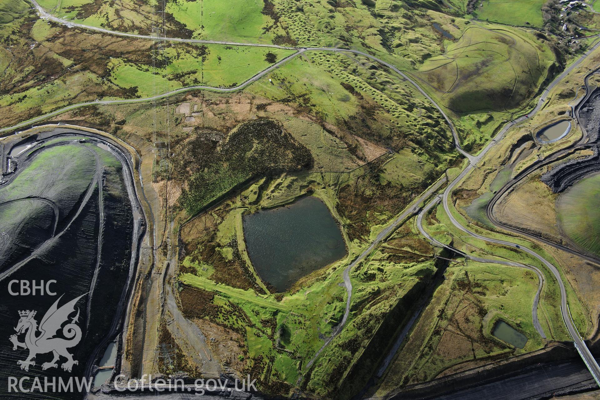 RCAHMW colour oblique photograph of Sarn Howell pond and industrial landscape. Taken by Toby Driver on 28/11/2012.