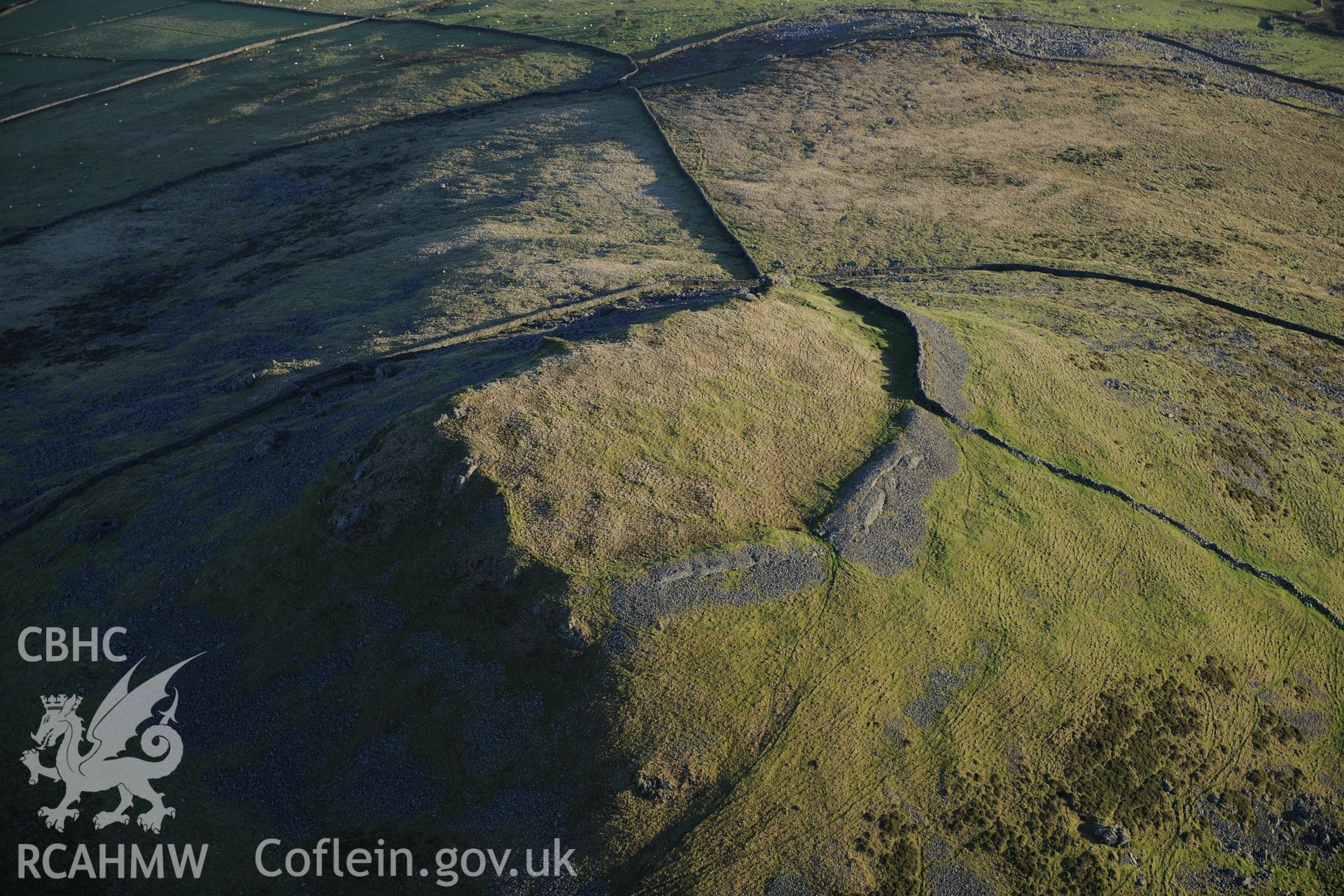 RCAHMW colour oblique photograph of Pen y Gaer hillfort. Taken by Toby Driver on 10/12/2012.