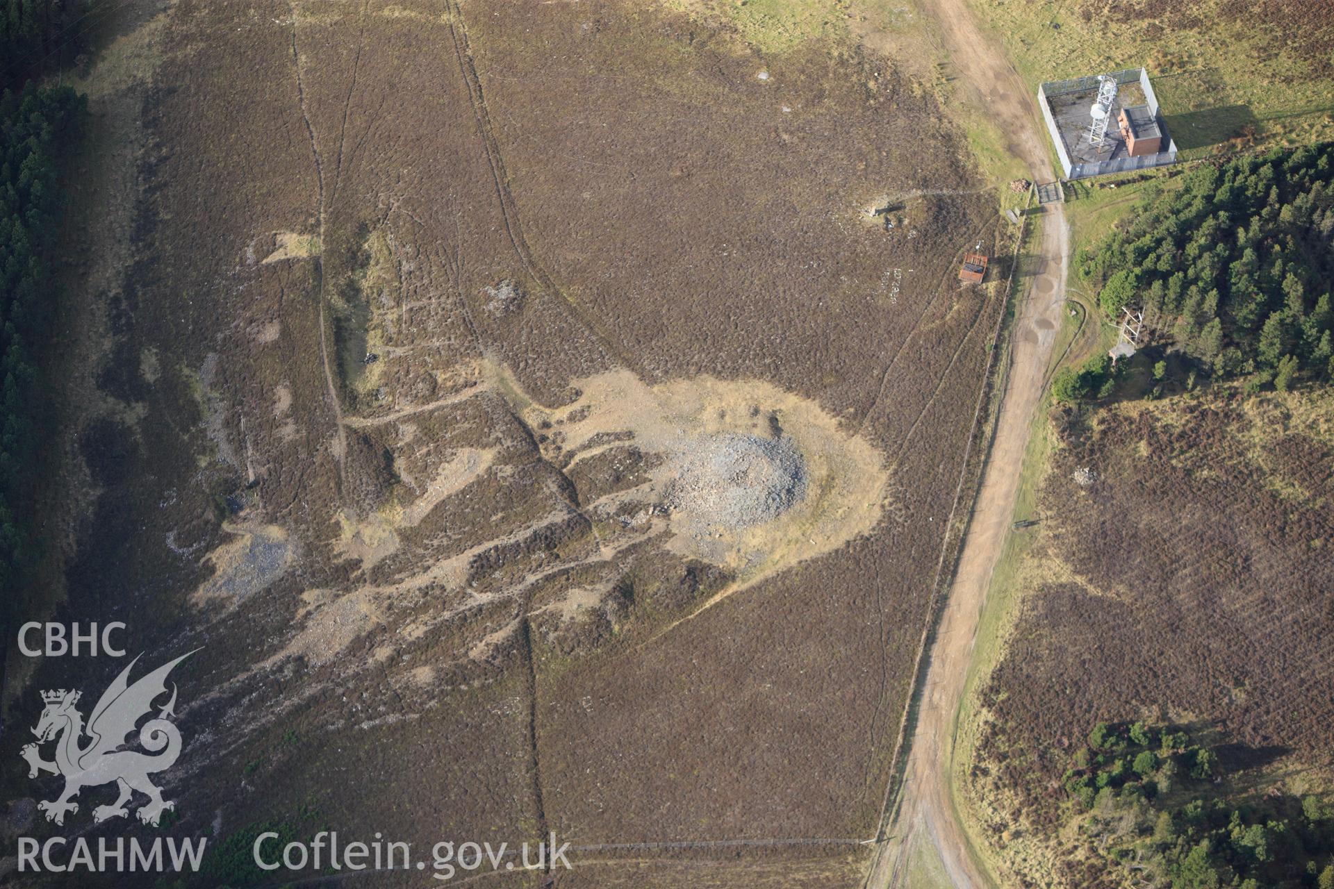 RCAHMW colour oblique photograph of Foel Fynyddau cairn, and Cwmafan Copper Works flue. Taken by Toby Driver on 28/11/2012.