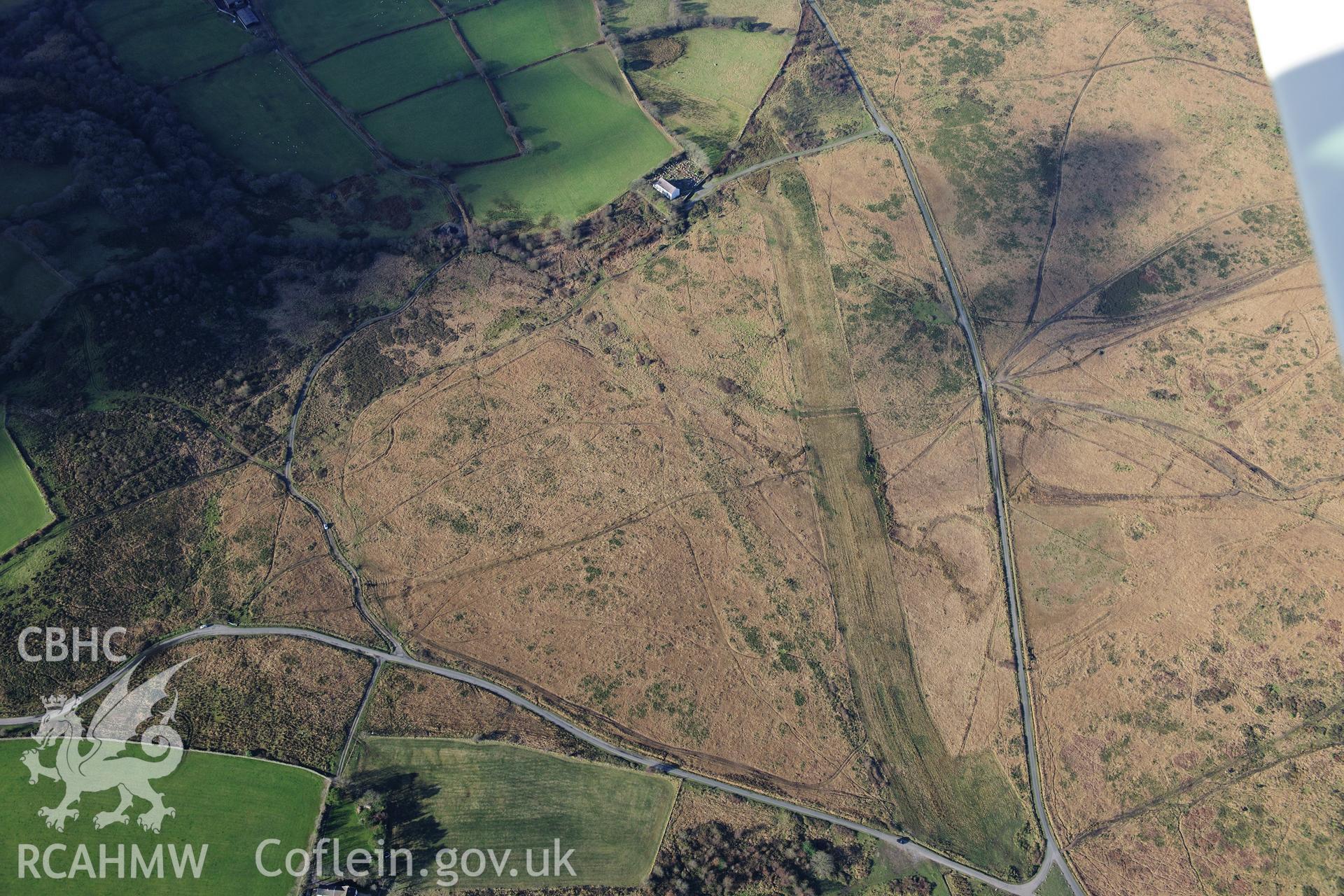 RCAHMW colour oblique photograph of Mynydd Gellionnen cairn, and course of LNG gas pipeline. Taken by Toby Driver on 28/11/2012.