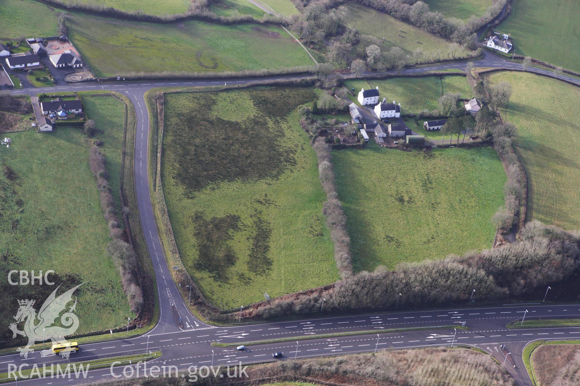 RCAHMW colour oblique photograph of Ring Cairn, north-east of Heol Ddu. Taken by Toby Driver on 27/01/2012.