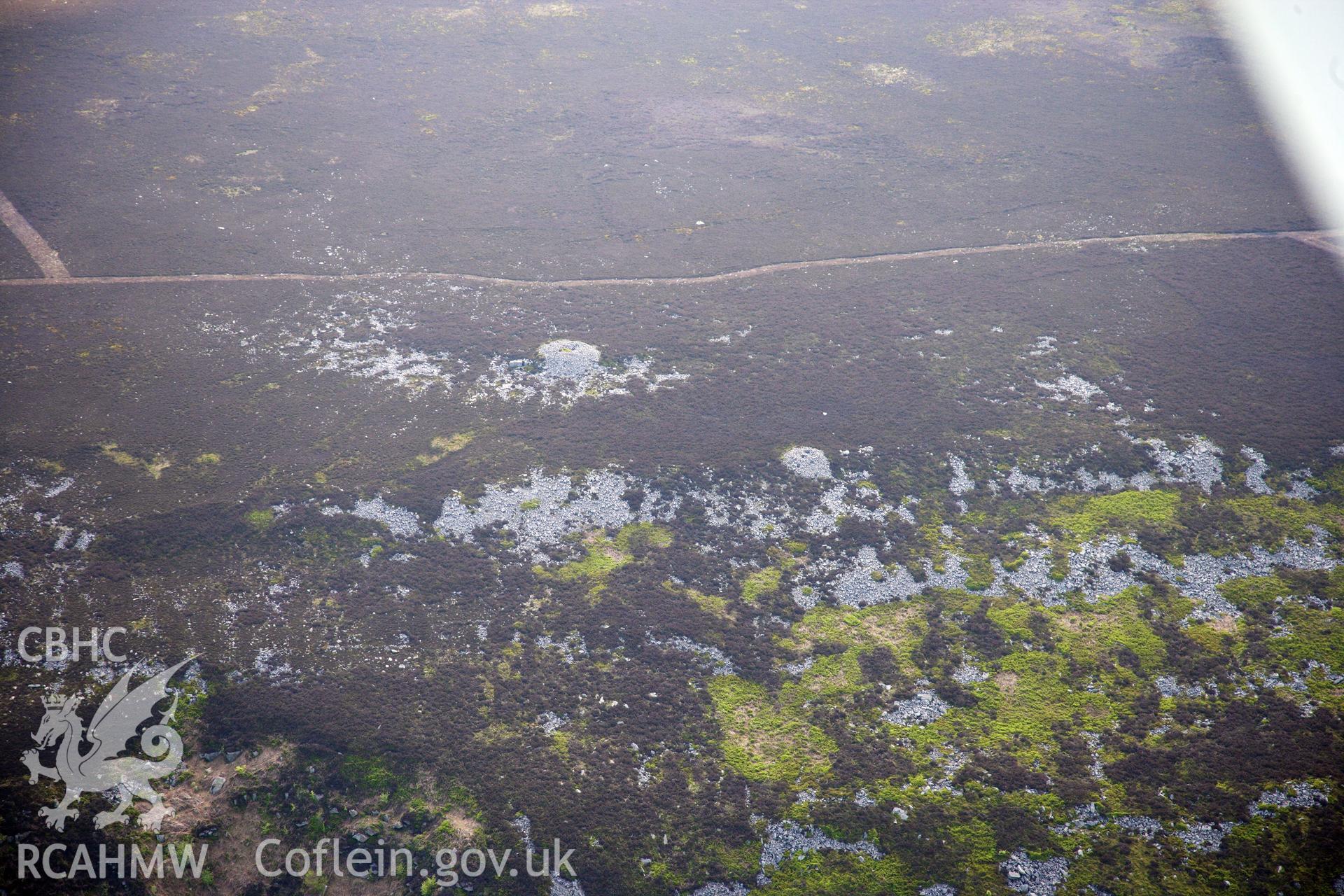 RCAHMW colour oblique photograph of Carn y Defaid round cairns. Taken by Toby Driver on 22/05/2012.