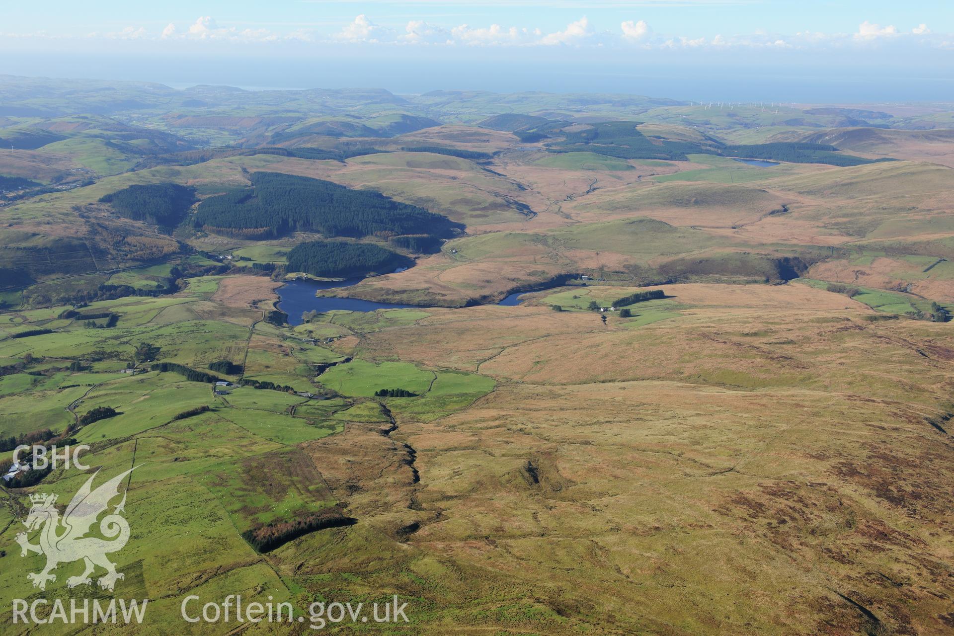 RCAHMW colour oblique photograph of Dinas Reservoir, upland landscape from Bryn Glas, looking west. Taken by Toby Driver on 05/11/2012.