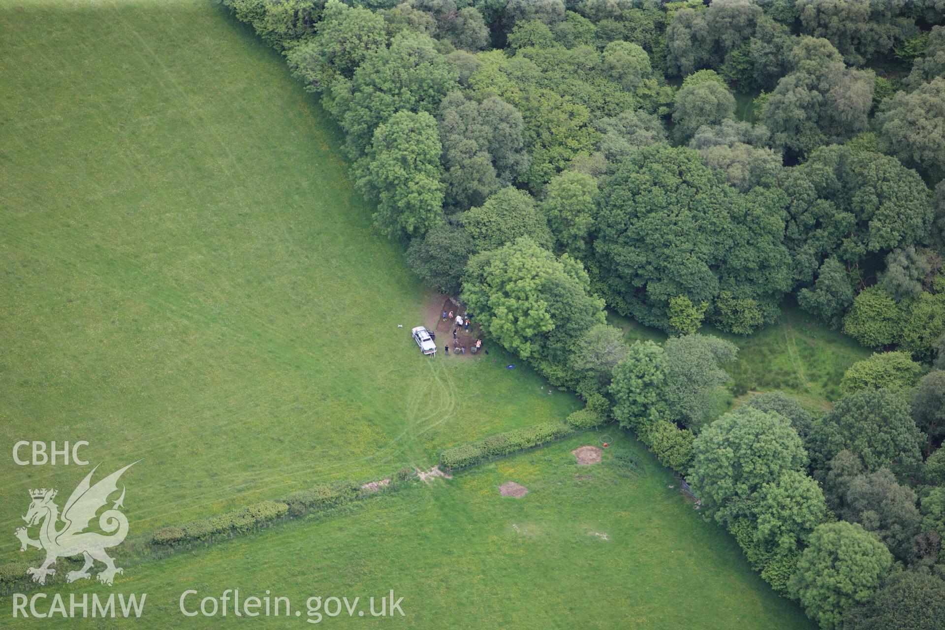 RCAHMW colour oblique photograph of Trial excavation trench south of Gatehouse, Strata Florida Abbey Precinct. Taken by Toby Driver on 19/06/2012.