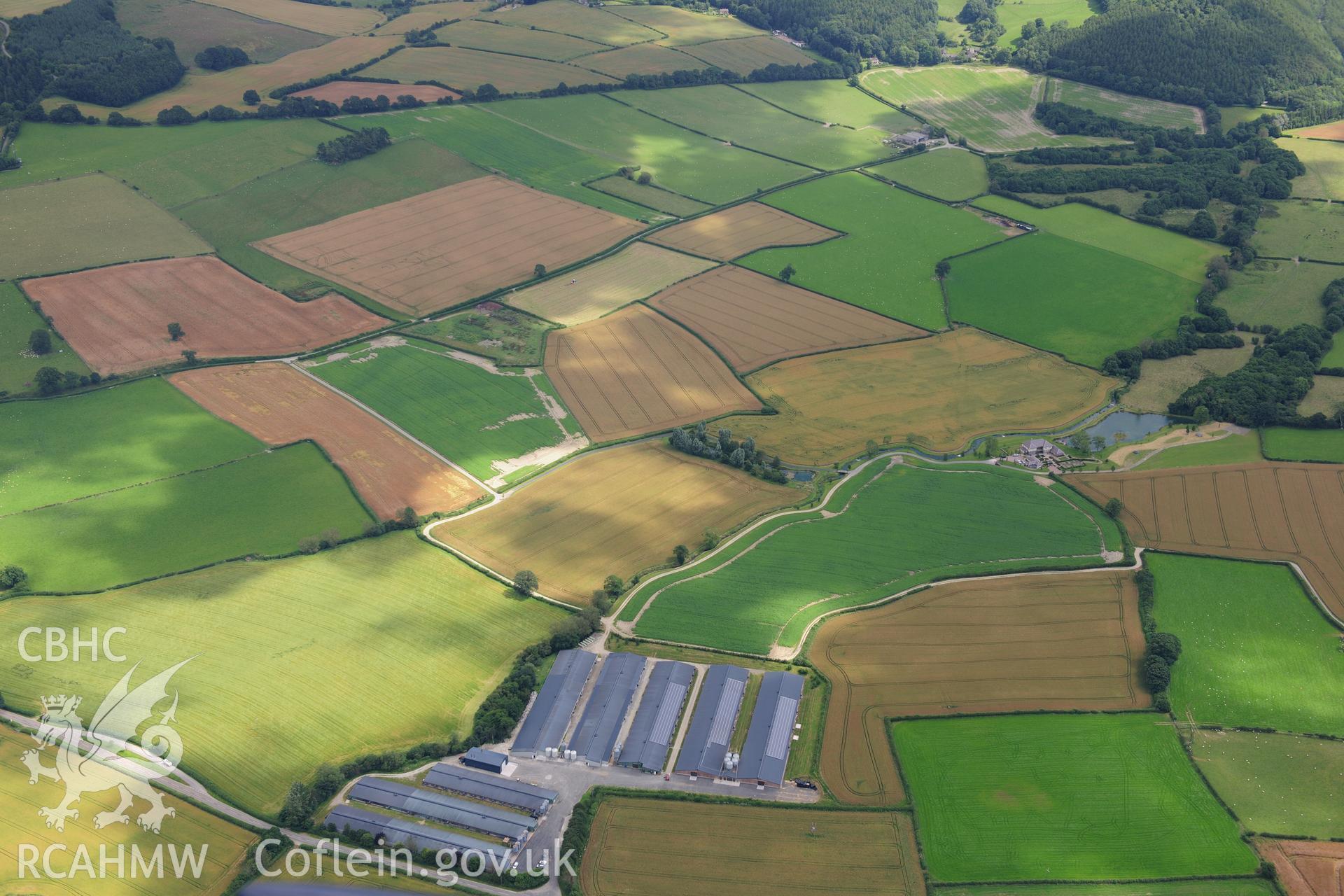 RCAHMW colour oblique photograph of Offa's Dyke, distant view from west over Knobley. Taken by Toby Driver on 27/07/2012.