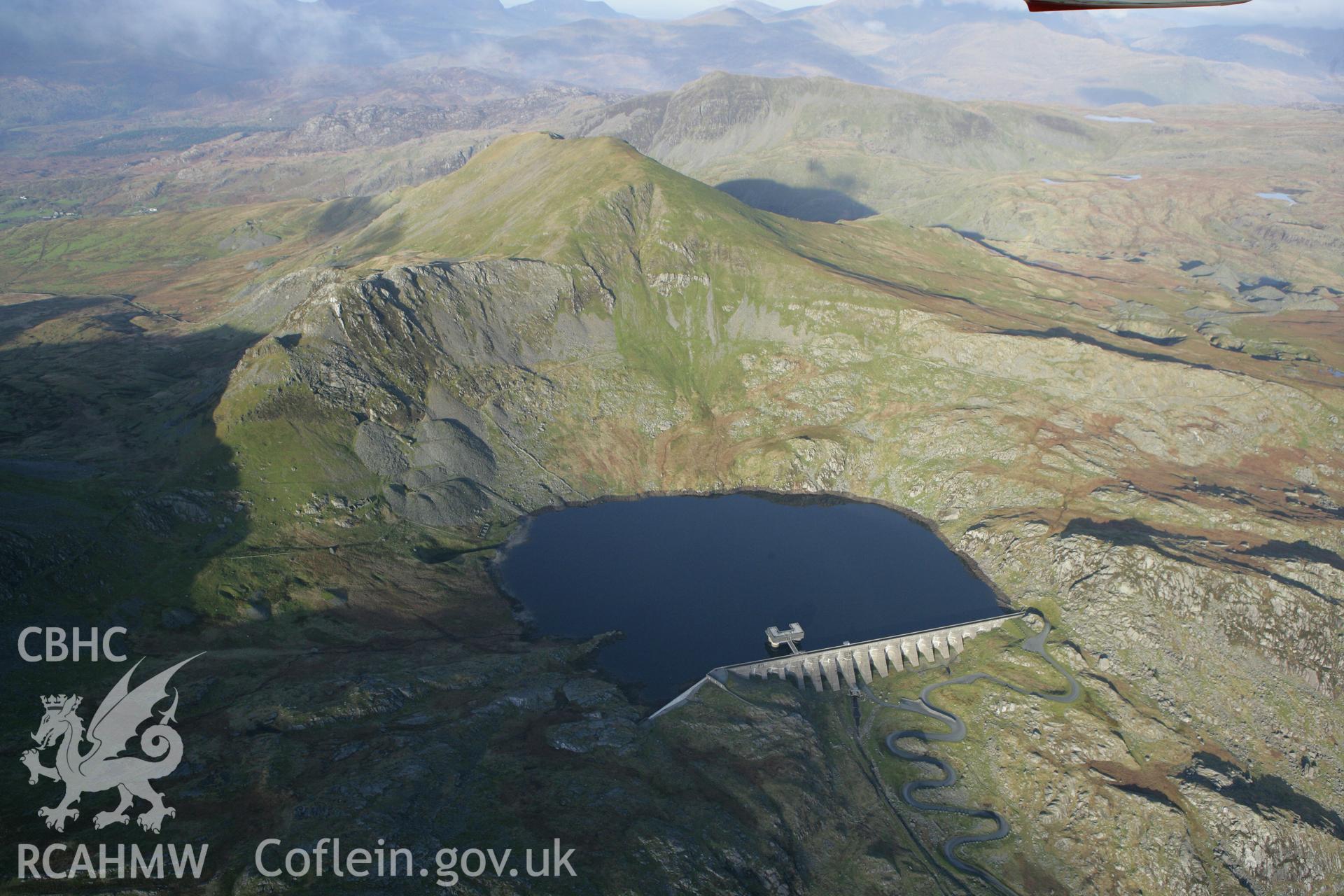 RCAHMW colour oblique photograph of Llyn Stwlan reservoir, with Moelwyn slate quarry. Taken by Toby Driver on 13/01/2012.