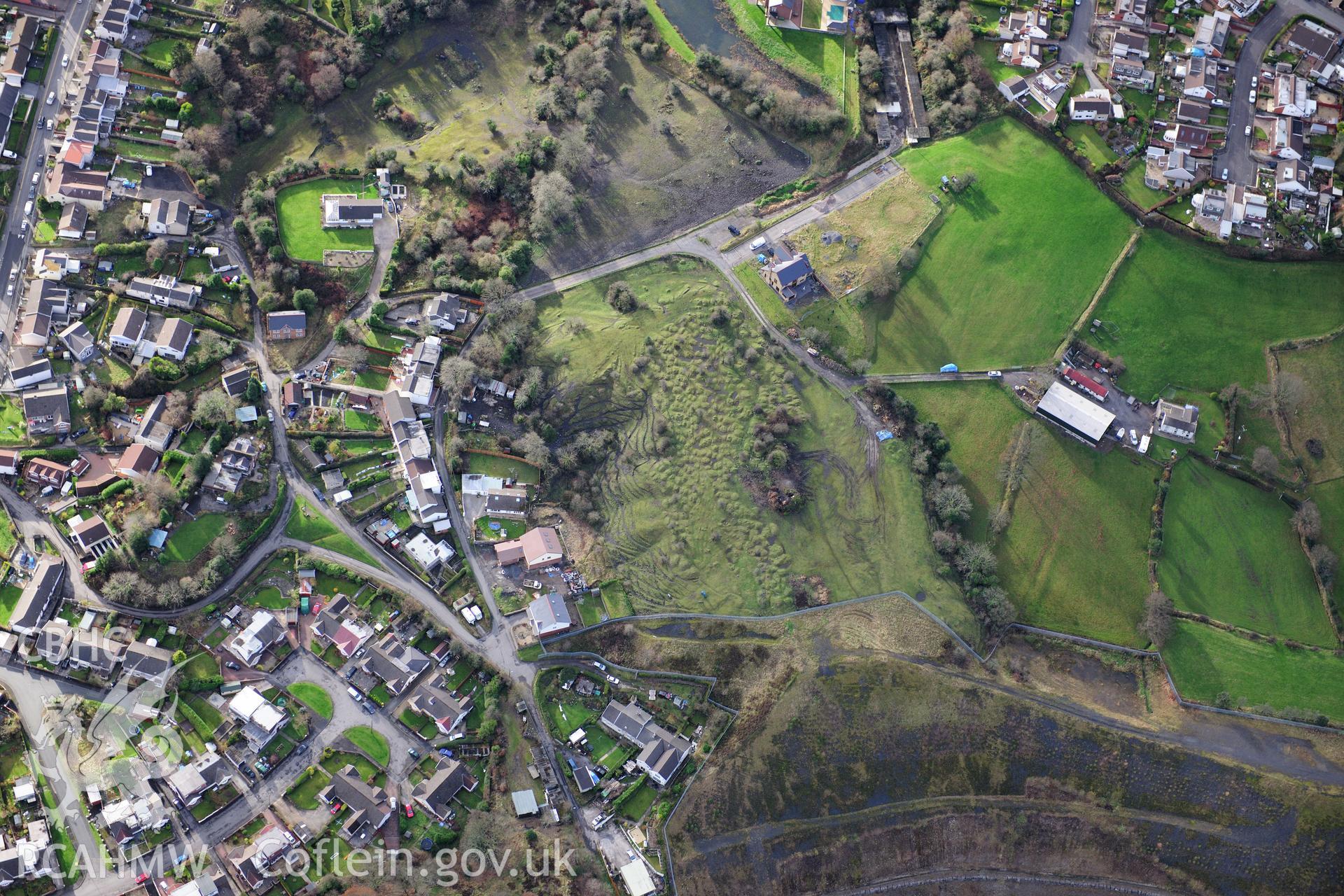 RCAHMW colour oblique photograph of Pen yr Heolgerrig level, and surviving section of industrial landscape. Taken by Toby Driver on 28/11/2012.