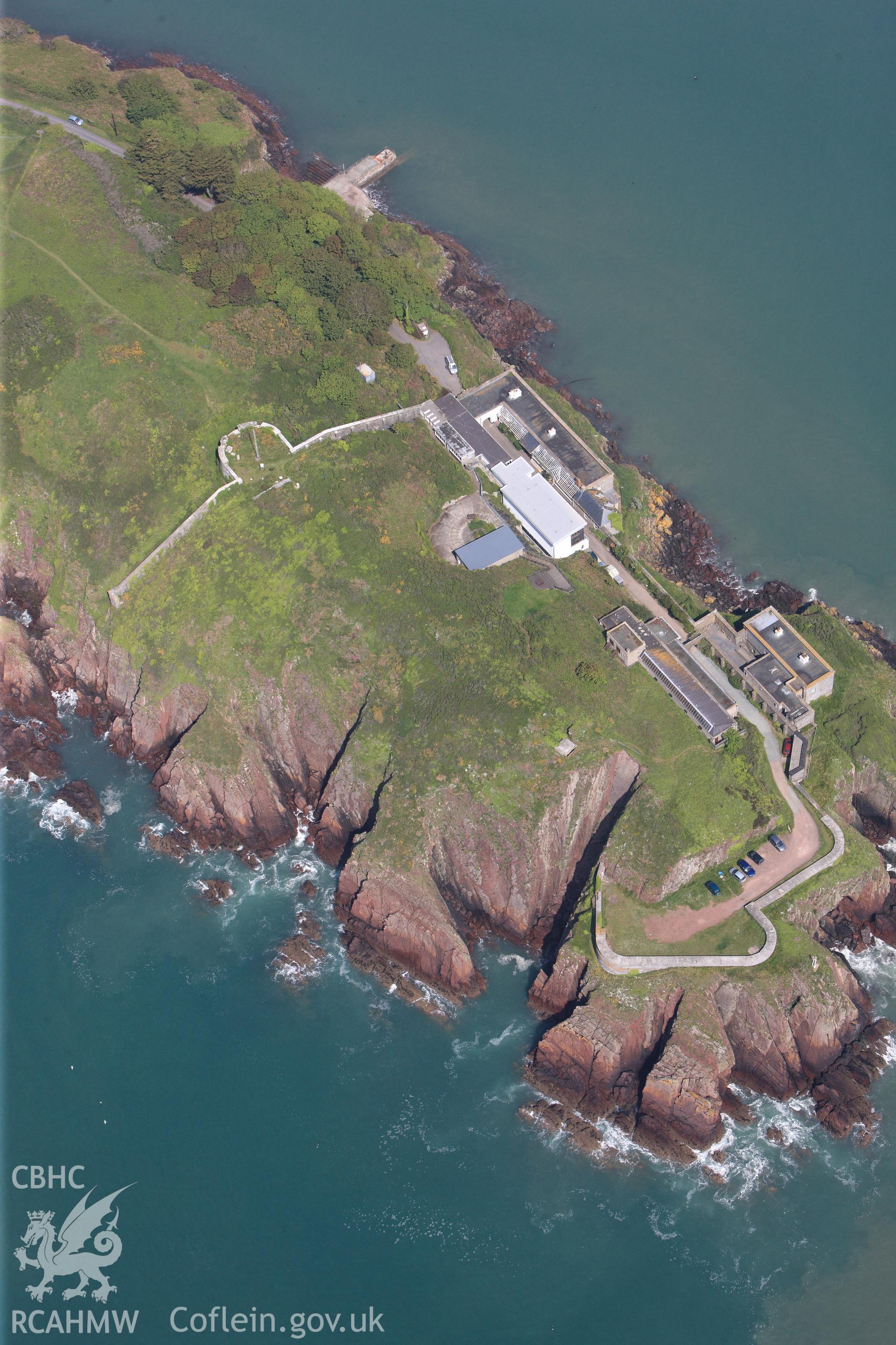 RCAHMW colour oblique photograph of General view of Dale Point promontory fort, looking north. Taken by Toby Driver on 24/05/2012.