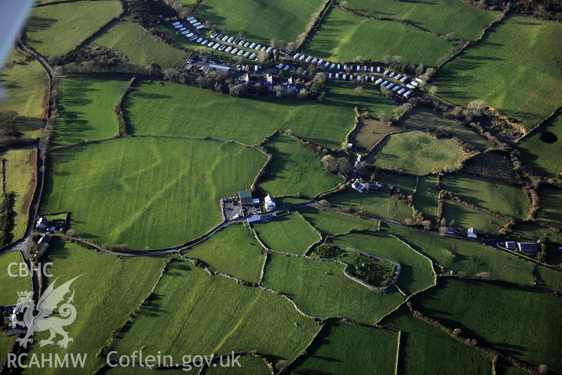 RCAHMW colour oblique photograph of Caer, Pen y Gaer, Glascoed, and field systems. Taken by Toby Driver on 10/12/2012.