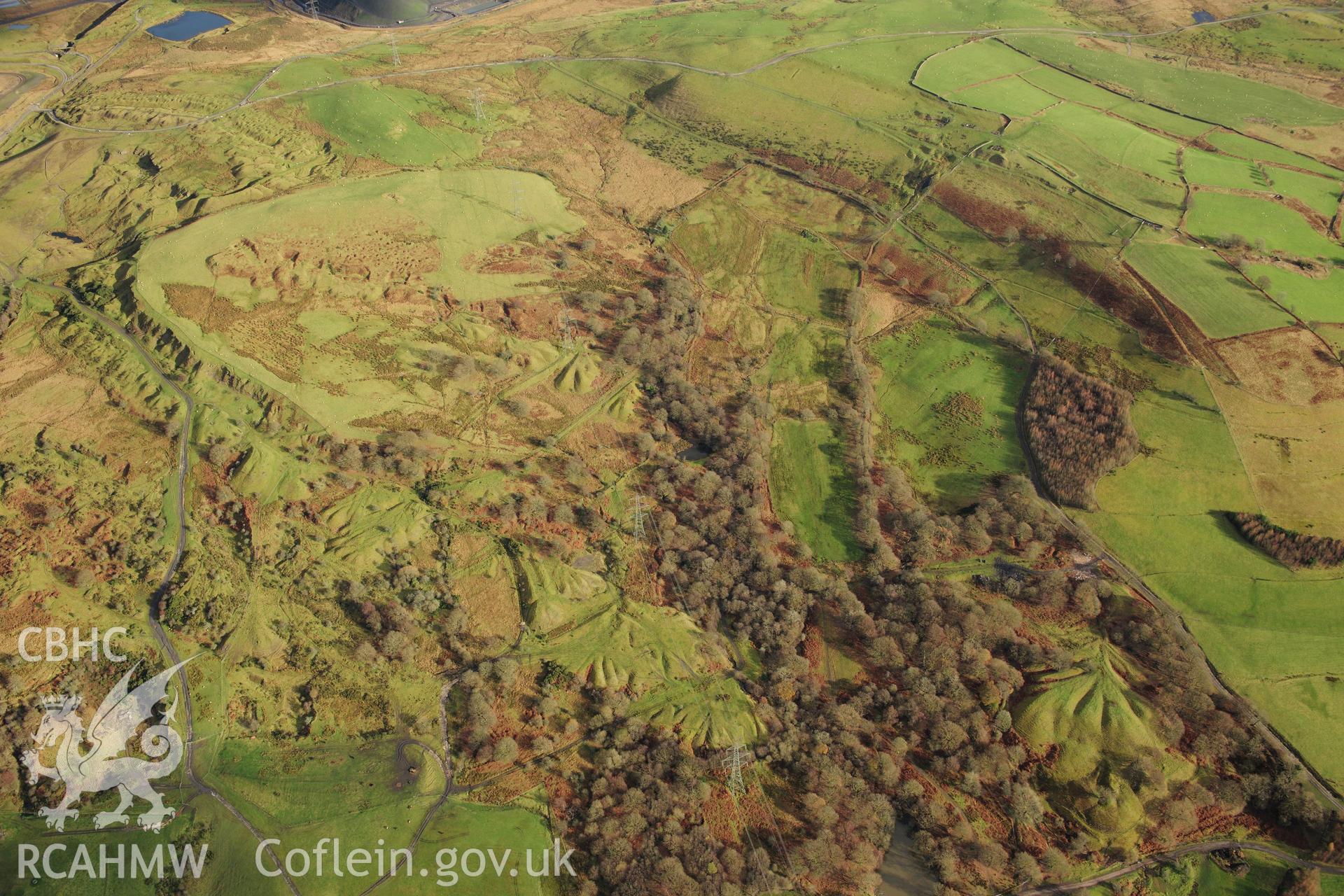 RCAHMW colour oblique photograph of Ironstone levels east of Plymouth Ironworks, industrial landscape. Taken by Toby Driver on 28/11/2012.