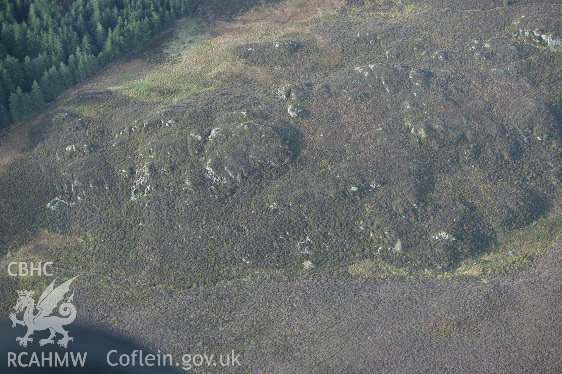 RCAHMW colour oblique photograph of Hut settlement west of Allt Goch. Taken by Toby Driver on 13/01/2012.