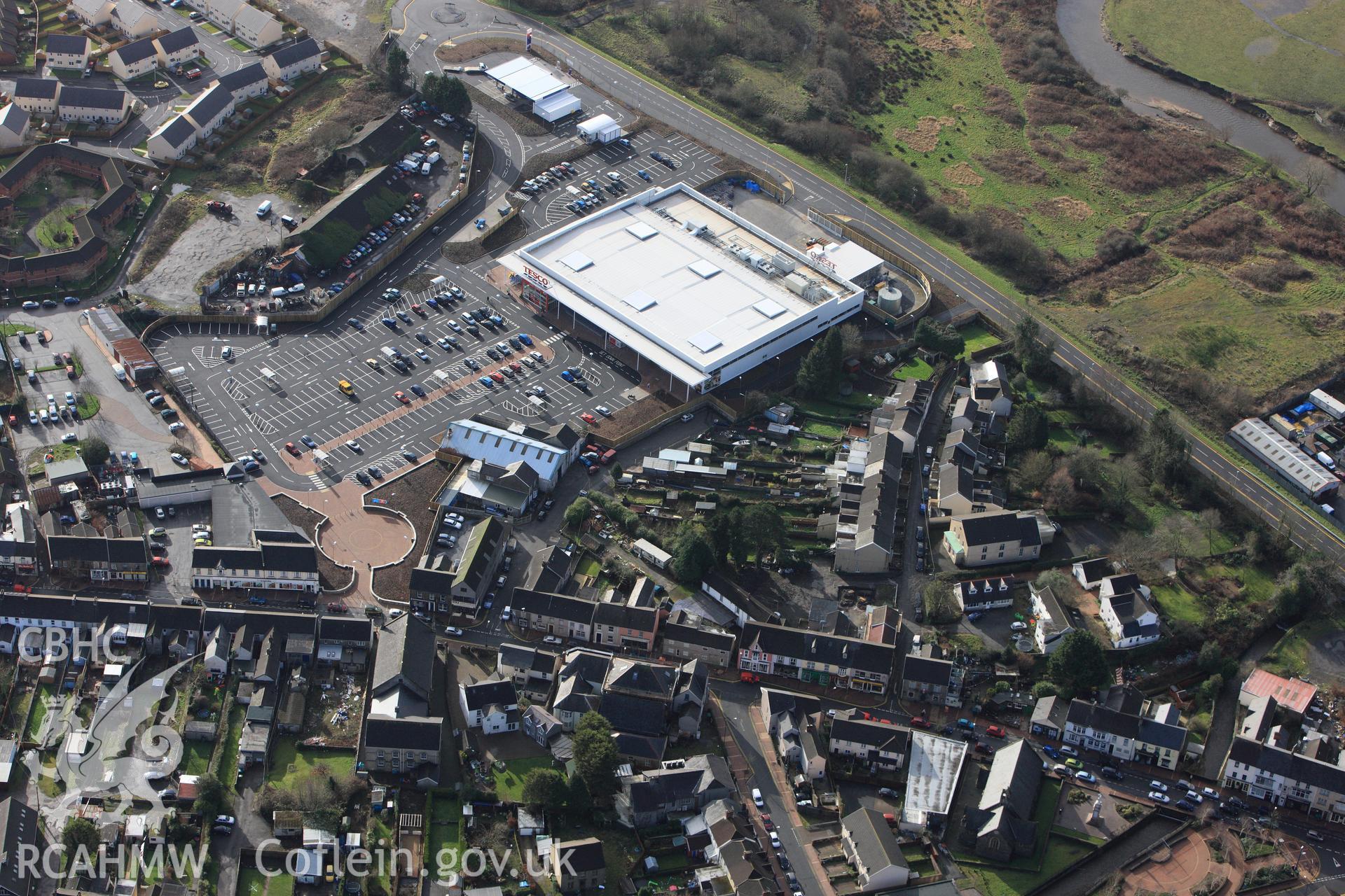 RCAHMW colour oblique photograph of Tescos development, Pontarddulais. Taken by Toby Driver on 27/01/2012.