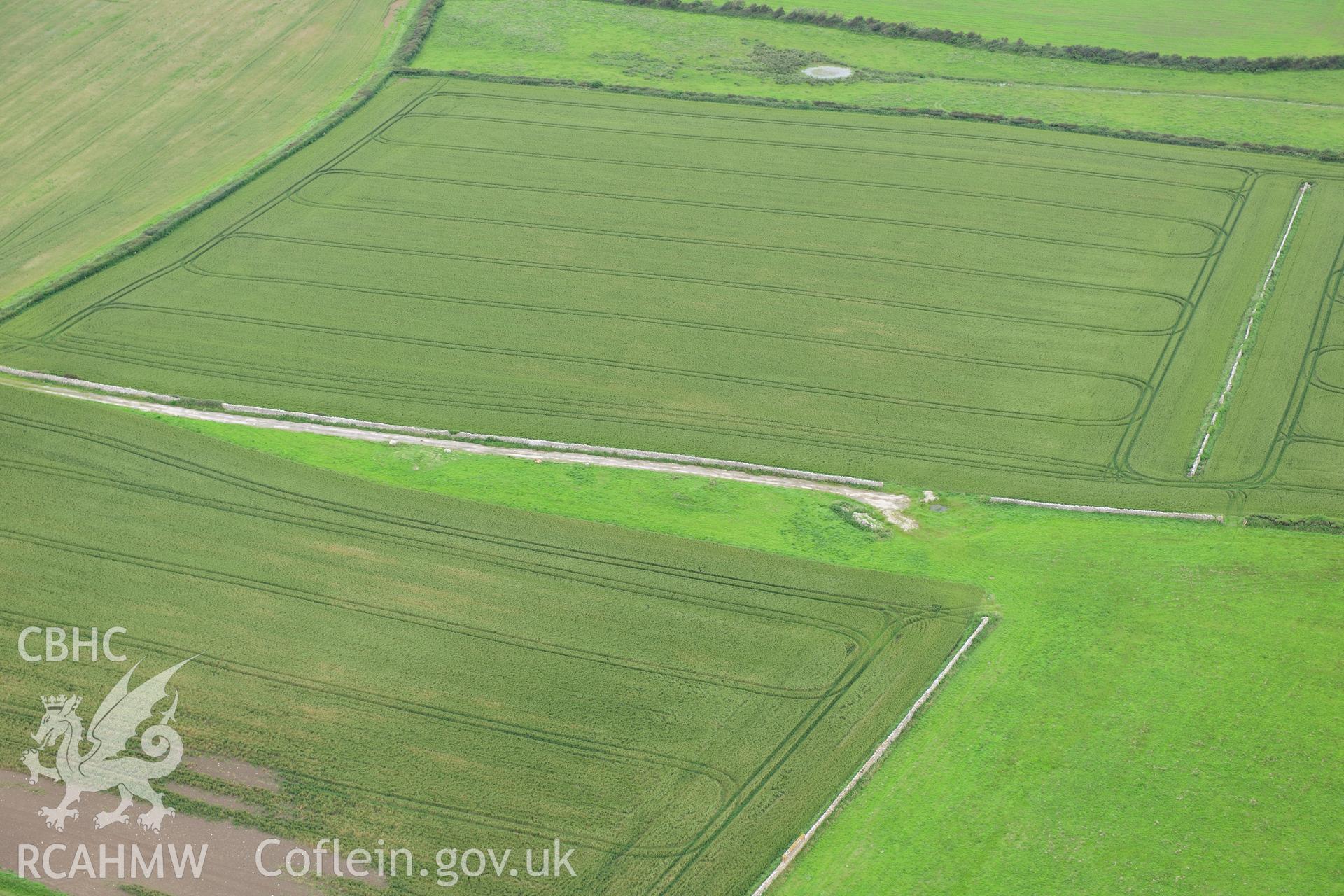 RCAHMW colour oblique photograph of Tumulus Mounds and Cairn. Taken by Toby Driver on 05/07/2012.