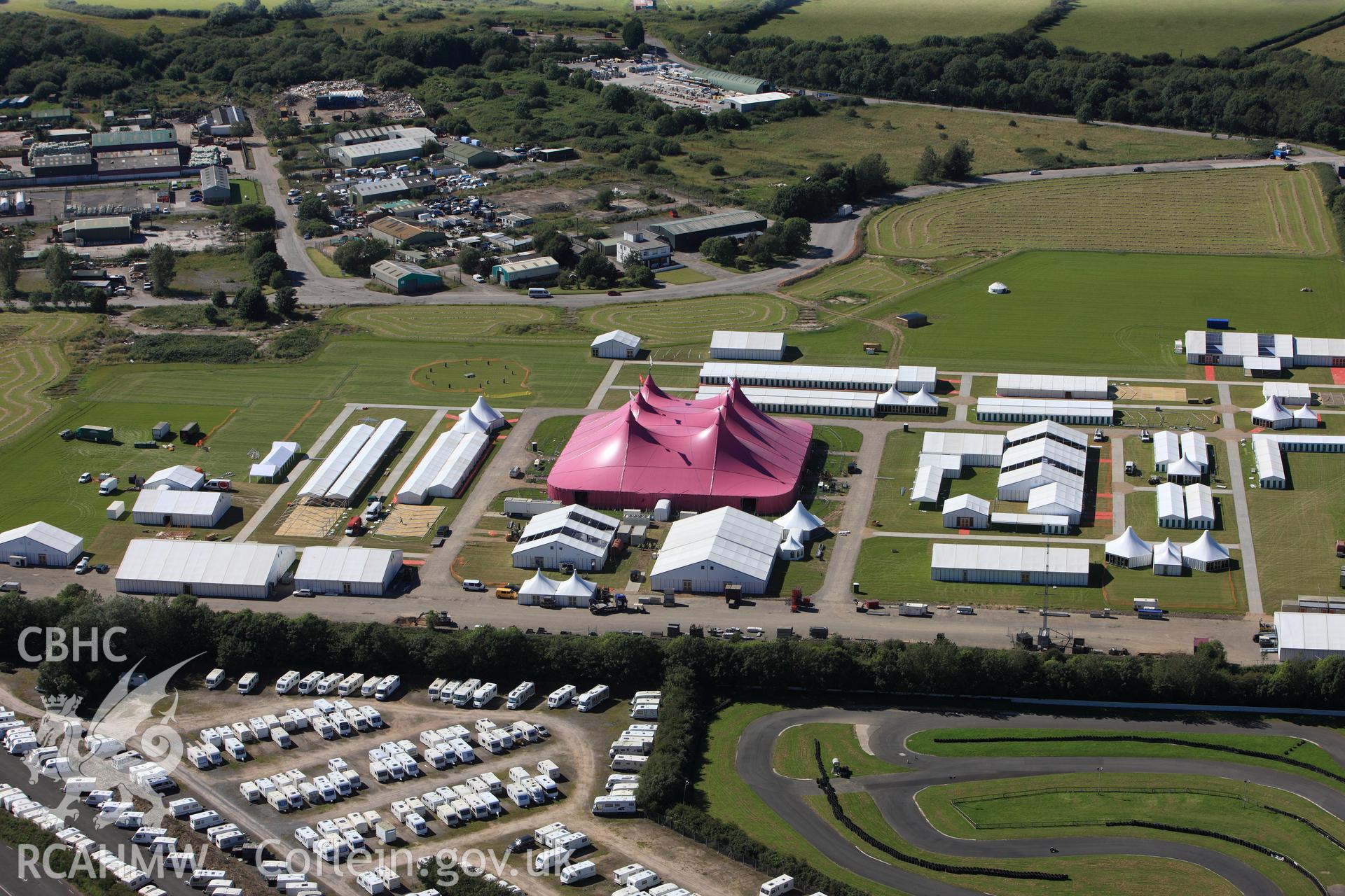 RCAHMW colour oblique photograph of Llandow Airfield, site of the 2012 National Eisteddfod of Wales. Taken by Toby Driver on 24/07/2012.