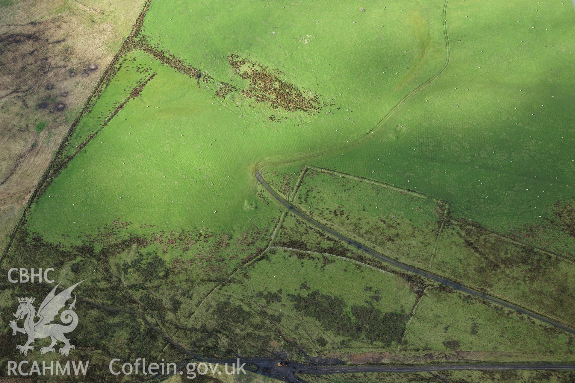 RCAHMW colour oblique photograph of Mynydd March Hywel east, platform house. Taken by Toby Driver on 28/11/2012.