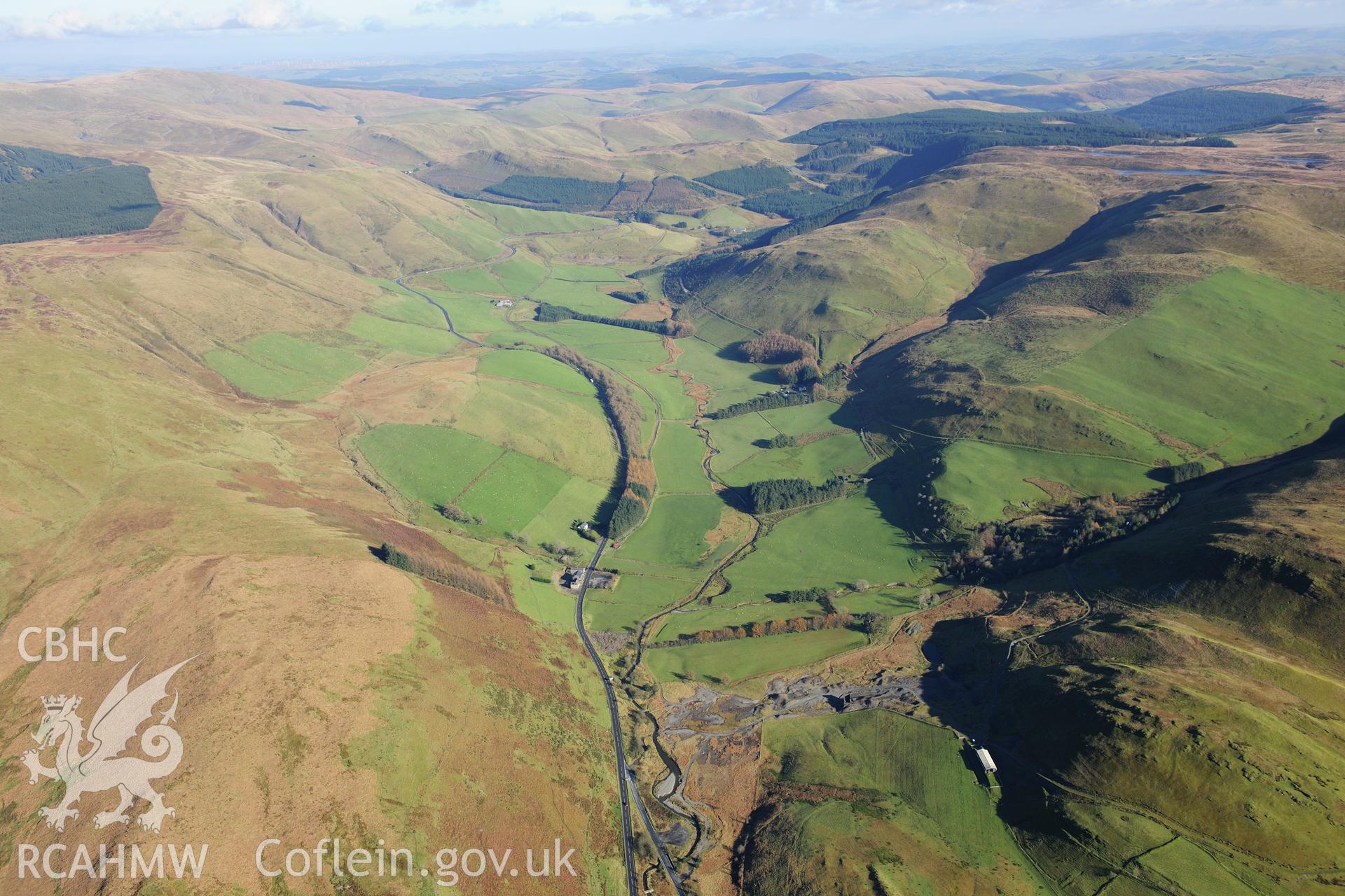 RCAHMW colour oblique photograph of Castell Mine, lead mine, wide landscape view looking east. Taken by Toby Driver on 05/11/2012.