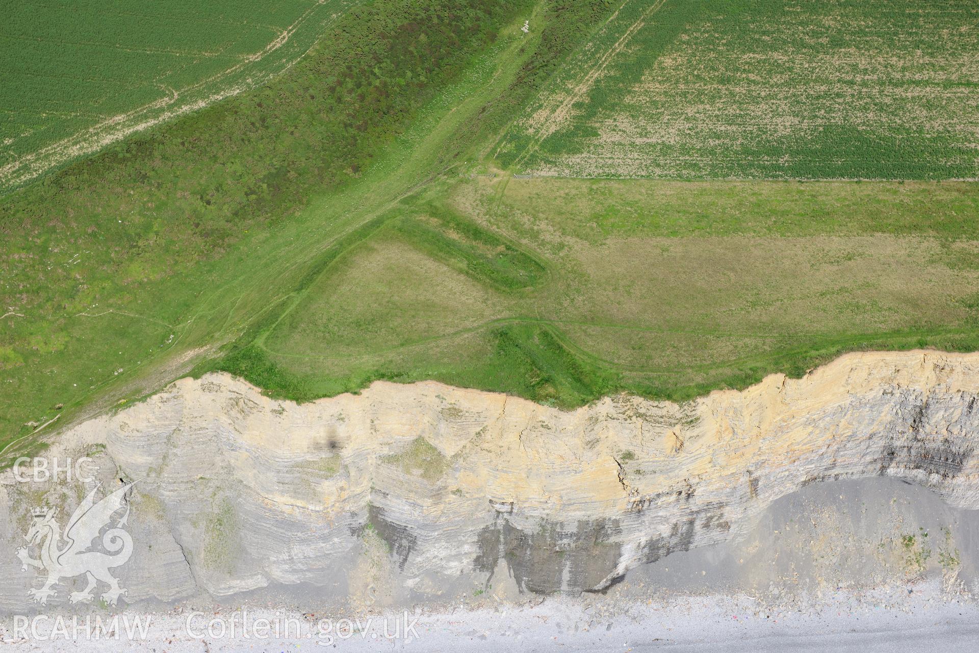 RCAHMW colour oblique photograph of Cwm Bach Camps, with cliff erosion. Taken by Toby Driver on 24/07/2012.