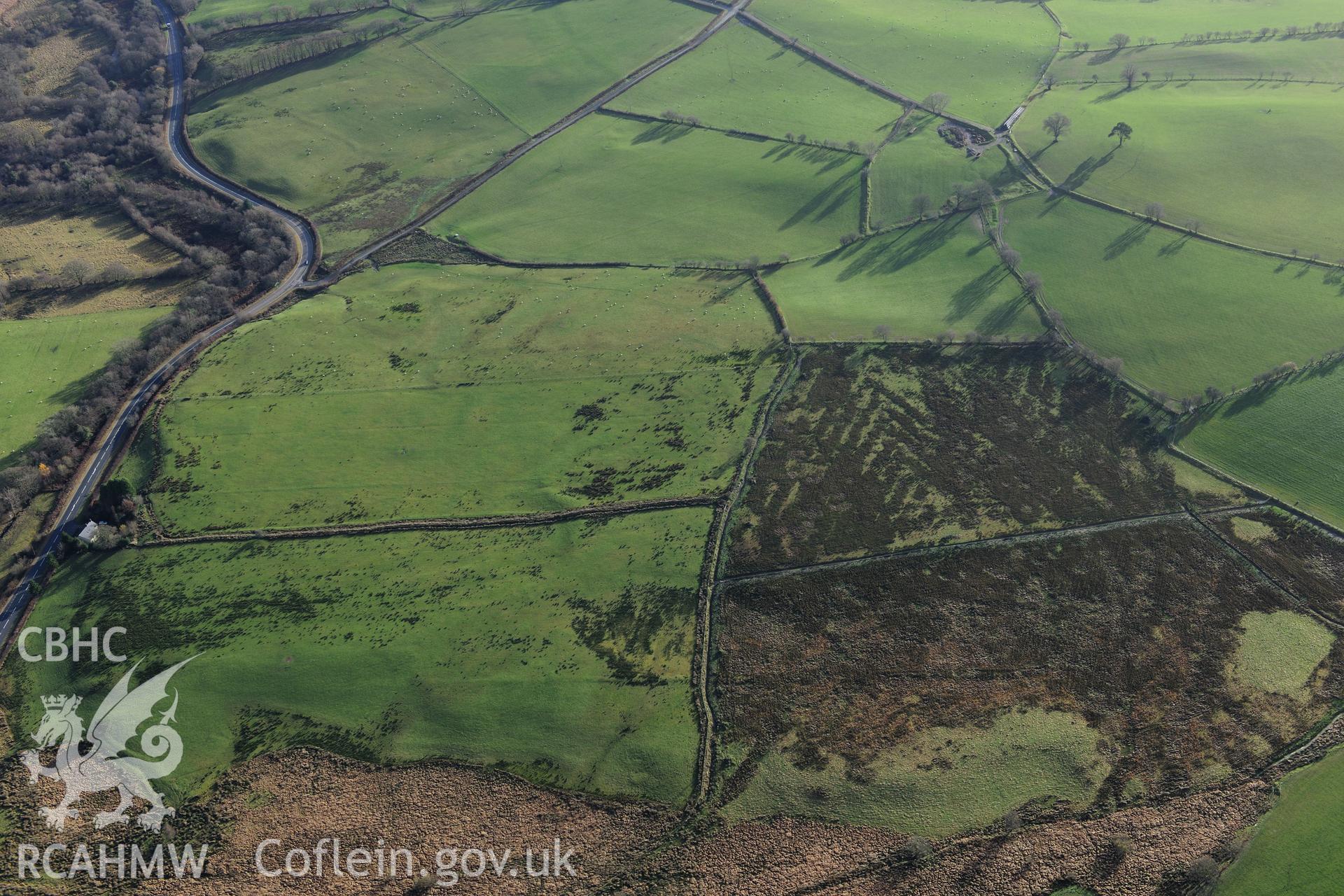 RCAHMW colour oblique photograph of Roman camps north of Caerau, Beulah (site of). Taken by Toby Driver on 23/11/2012.