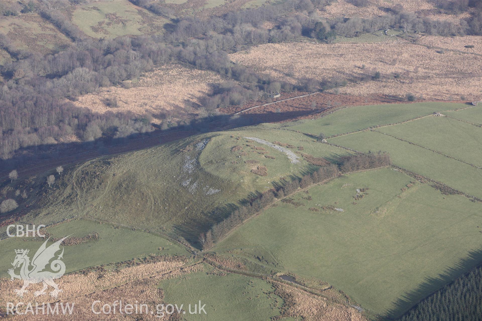 RCAHMW colour oblique photograph of Caer Cadwgan Hillfort. Taken by Toby Driver on 07/02/2012.