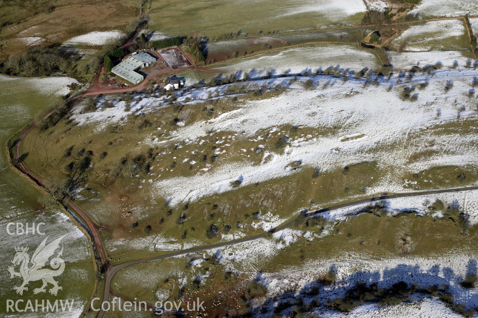 RCAHMW colour oblique photograph of Beddau'r Derwyddon Pillow Mound B. Taken by Toby Driver on 02/02/2012.