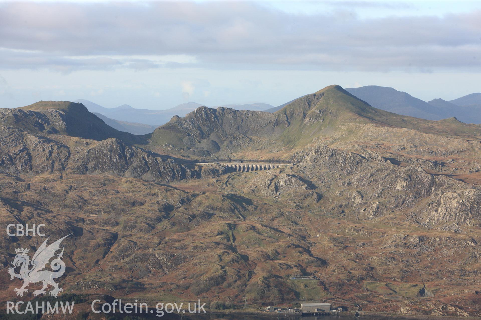 RCAHMW colour oblique photograph of Llyn Stwlan reservoir, with Moelwyn slate quarry. Taken by Toby Driver on 13/01/2012.