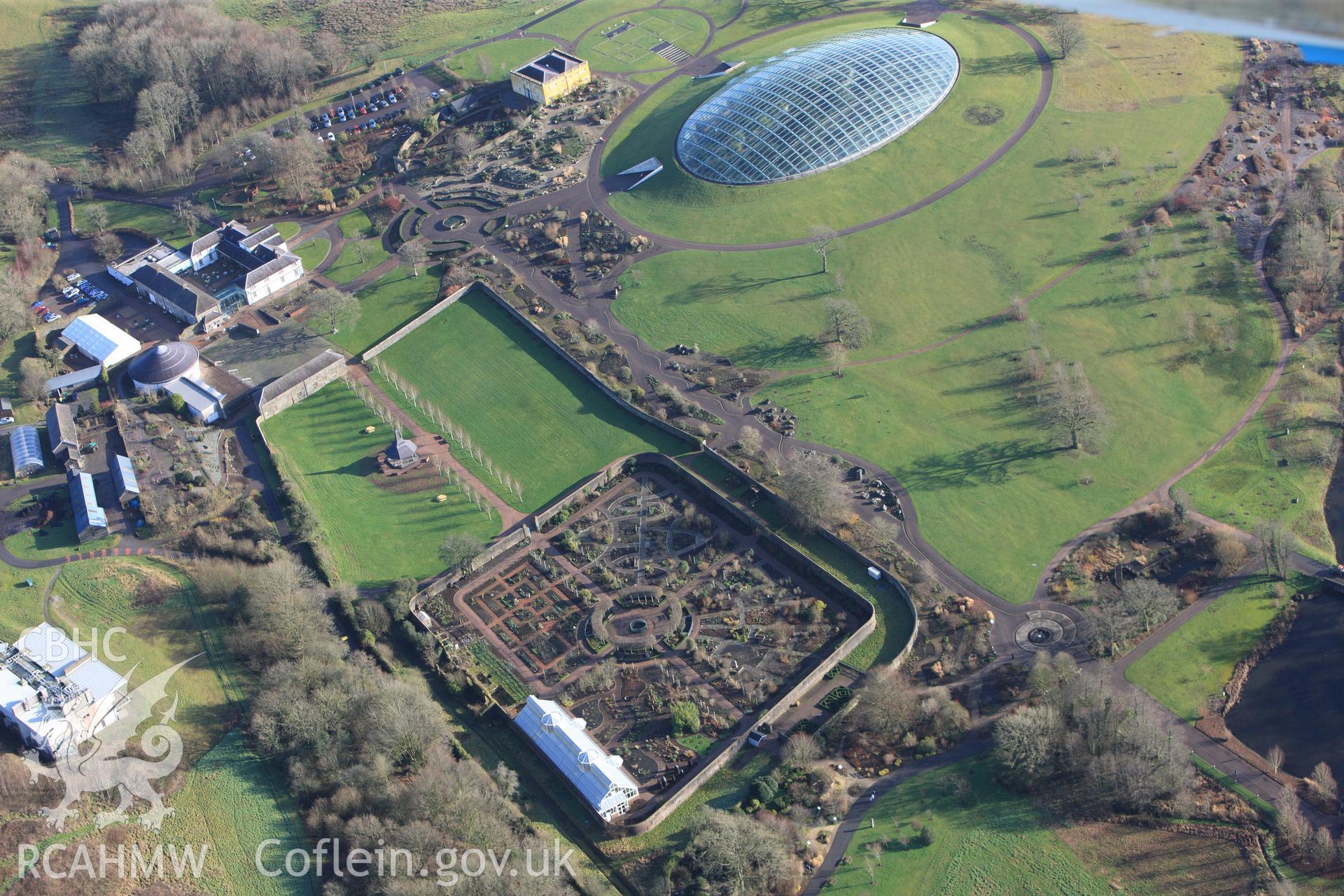 RCAHMW colour oblique photograph of The Great Glasshouse with walled garden, The National Botanic Garden of Wales. Taken by Toby Driver on 27/01/2012.