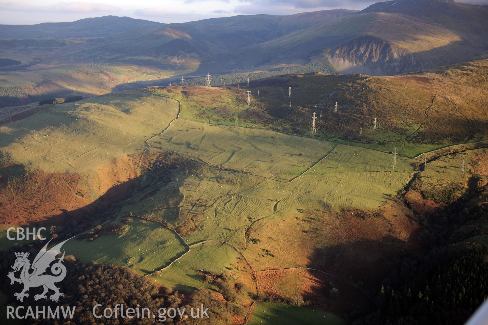 RCAHMW colour oblique photograph of Ffridd Ddu field system, and landscape. Taken by Toby Driver on 10/12/2012.