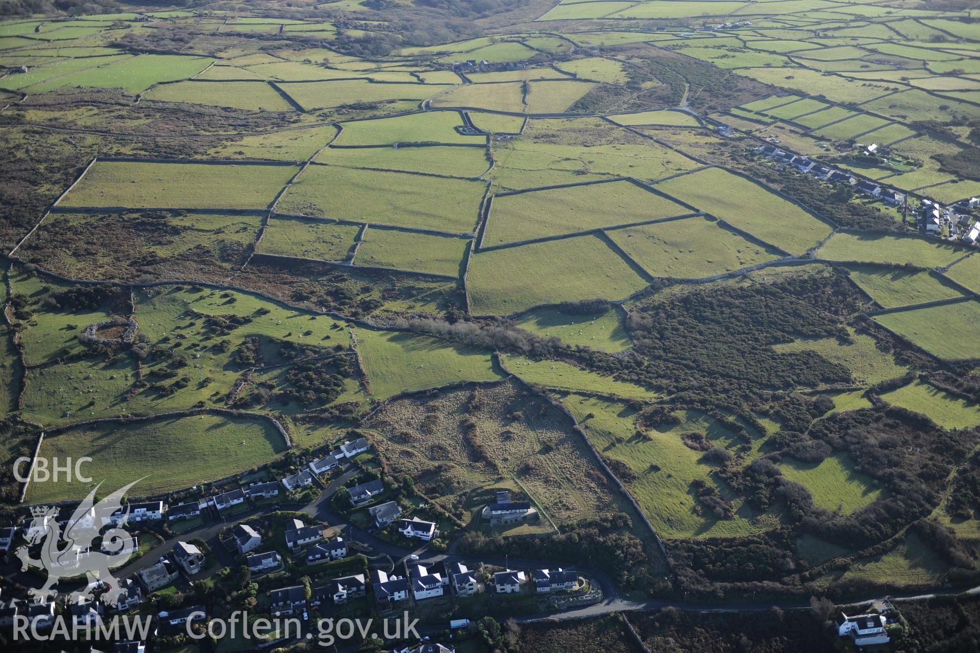 RCAHMW colour oblique photograph of Groes Las prehistoric settlement and field system. Taken by Toby Driver on 10/12/2012.