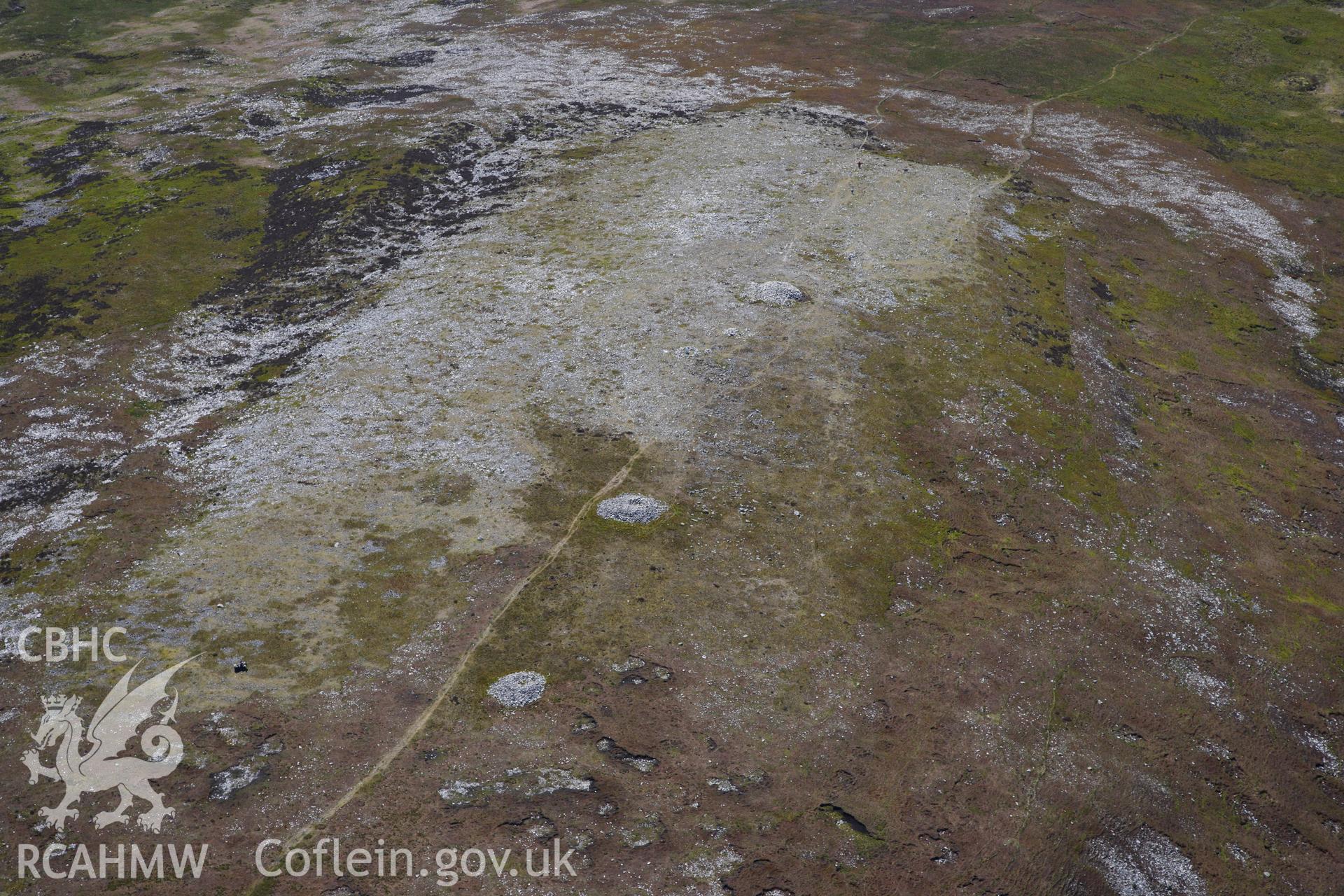 RCAHMW colour oblique photograph of Tair Carn Isaf, landscape from the north-east. Taken by Toby Driver on 22/05/2012.