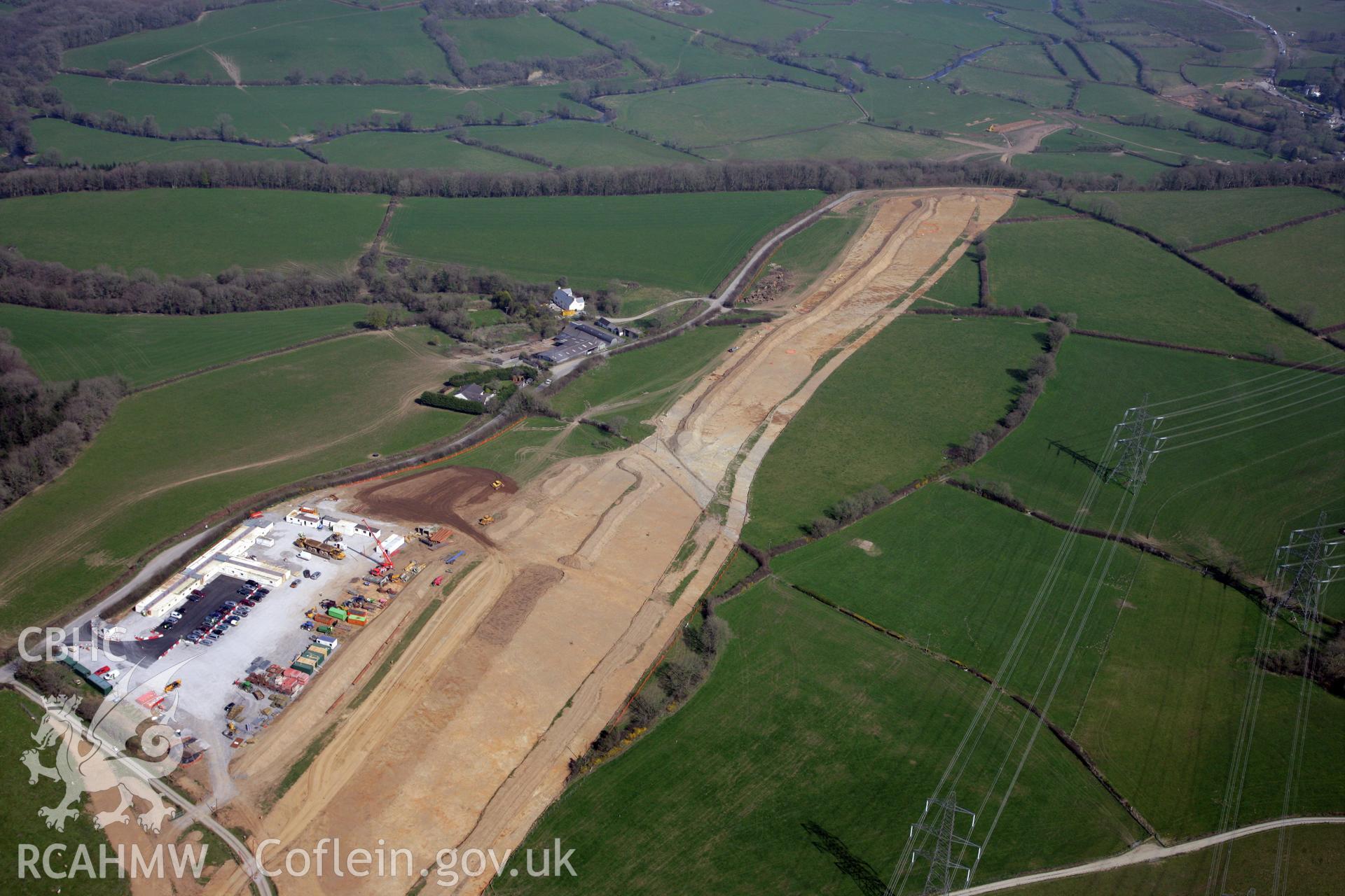 RCAHMW colour oblique photograph of A477 Bypass, west of Pentrehowell. General view with main depot for works. Taken by Toby Driver and Oliver Davies on 28/03/2012.