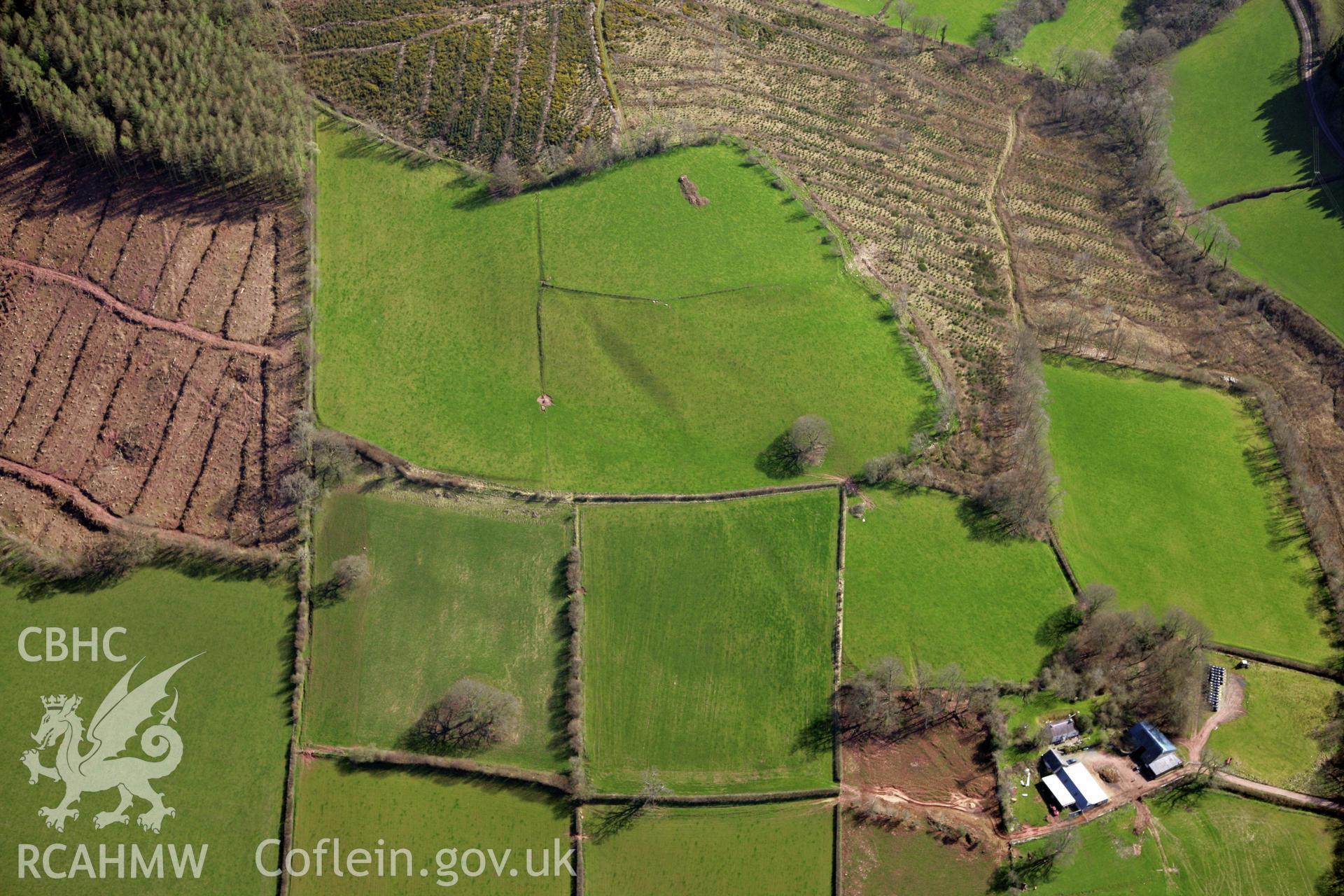 RCAHMW colour oblique photograph of Penpont-fach, denuded hillfort west of Twyn y Gaer hillfort. Taken by Toby Driver and Oliver Davies on 28/03/2012.