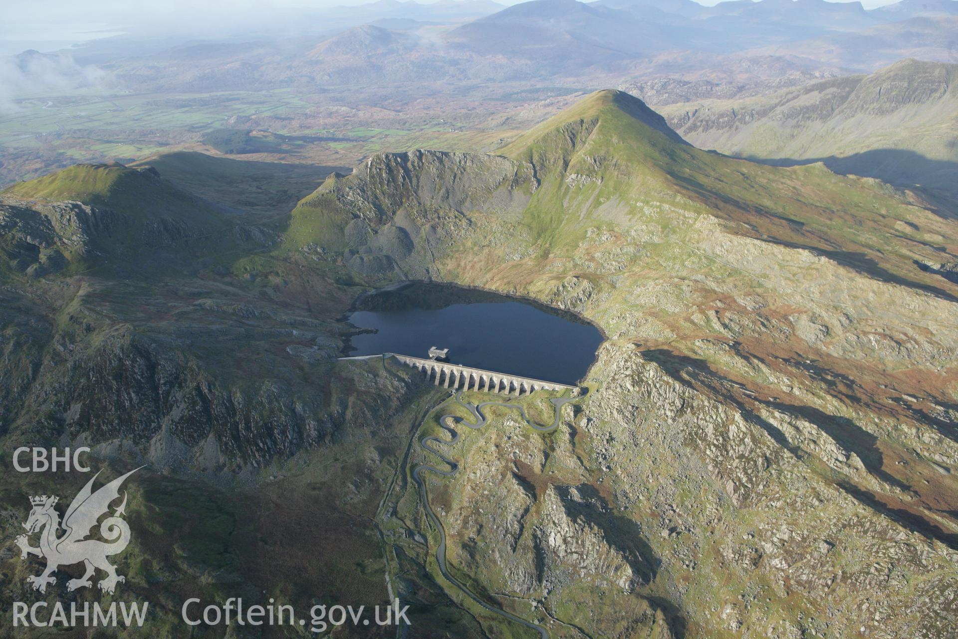 RCAHMW colour oblique photograph of Llyn Stwlan reservoir, with Moelwyn slate quarry. Taken by Toby Driver on 13/01/2012.