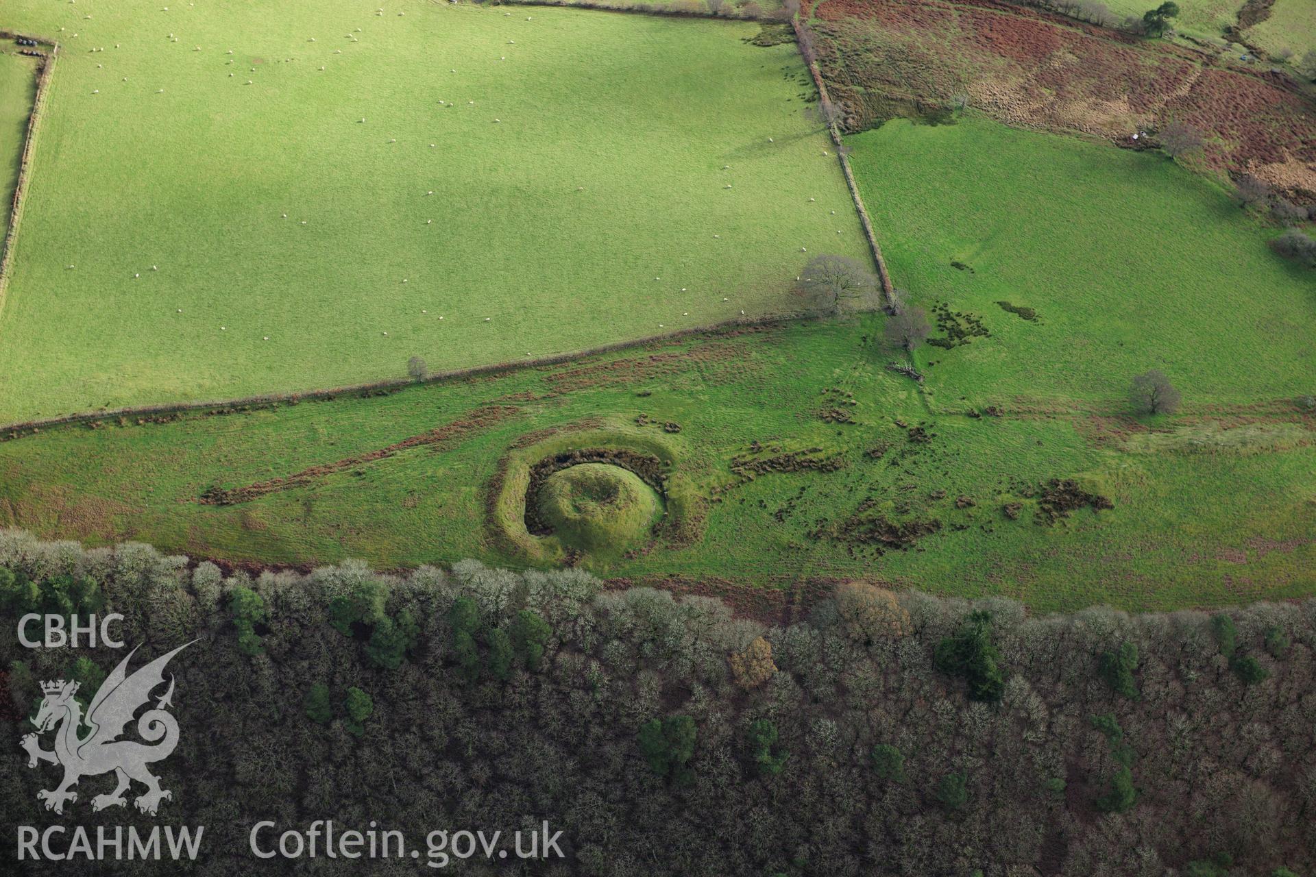 RCAHMW colour oblique photograph of Twdin mound with possilbe house platform visible above. Taken by Toby Driver on 23/11/2012.