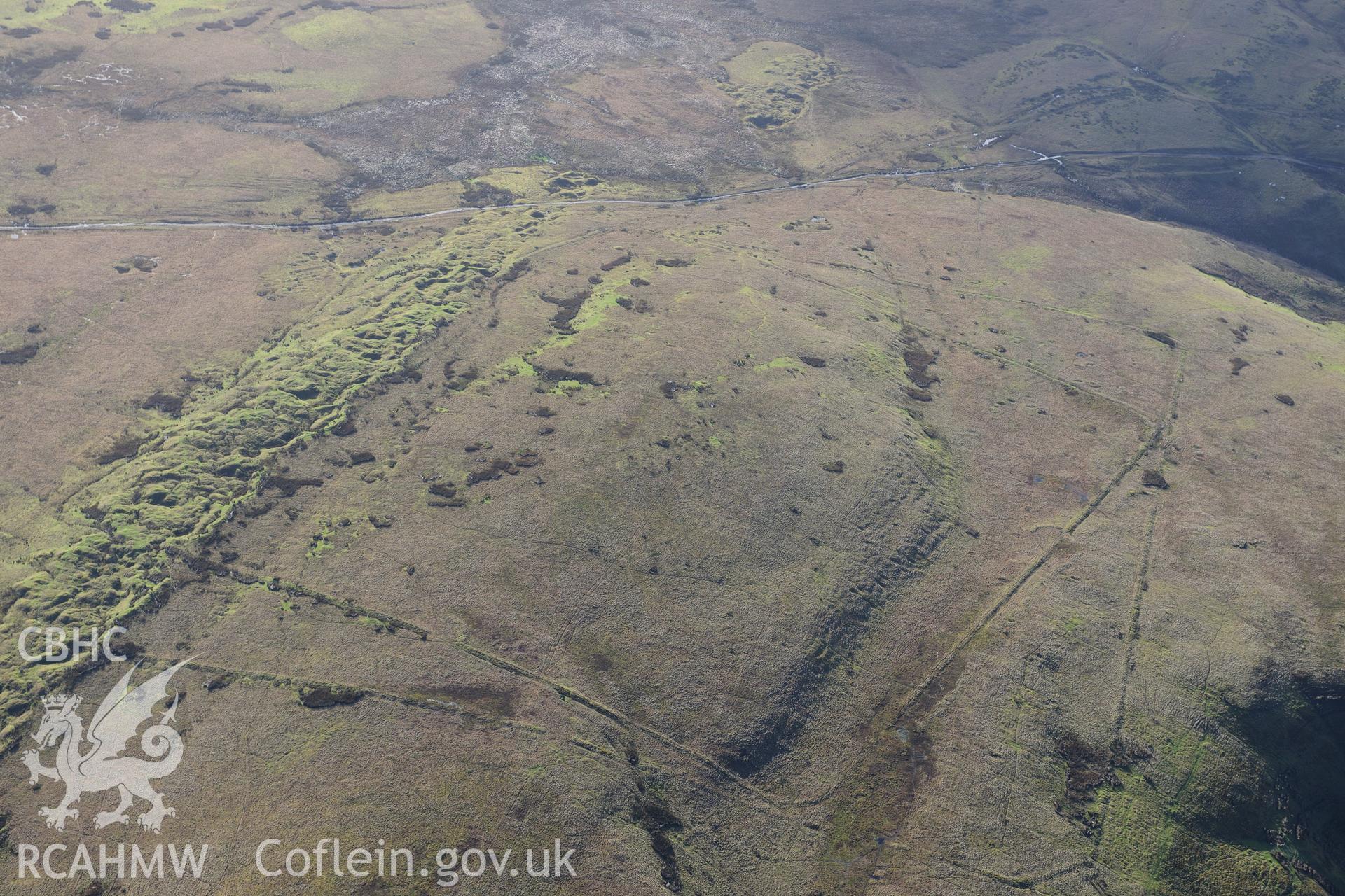 RCAHMW colour oblique photograph of Y Pigwn Roman camps. Taken by Toby Driver on 23/11/2012.