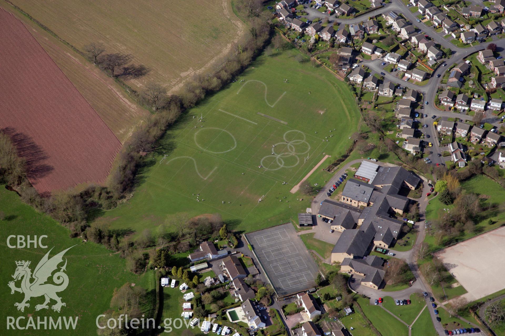 RCAHMW colour oblique photograph of Crickhowell High School, '2012' Olympic art in playing field. Taken by Toby Driver and Oliver Davies on 28/03/2012.