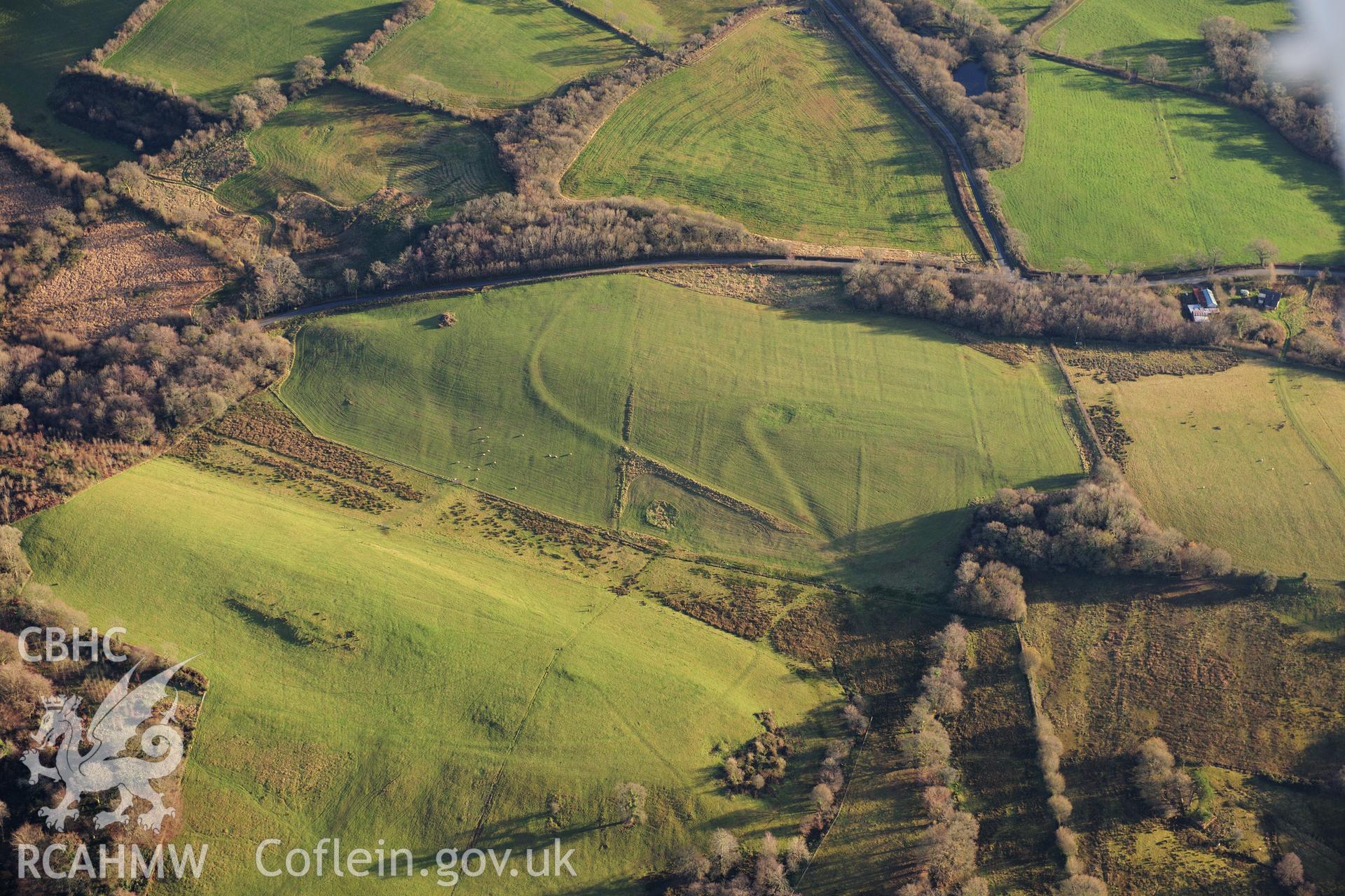 RCAHMW colour oblique photograph of Allt Goch Lodge, earthworks. Taken by Toby Driver on 28/11/2012.