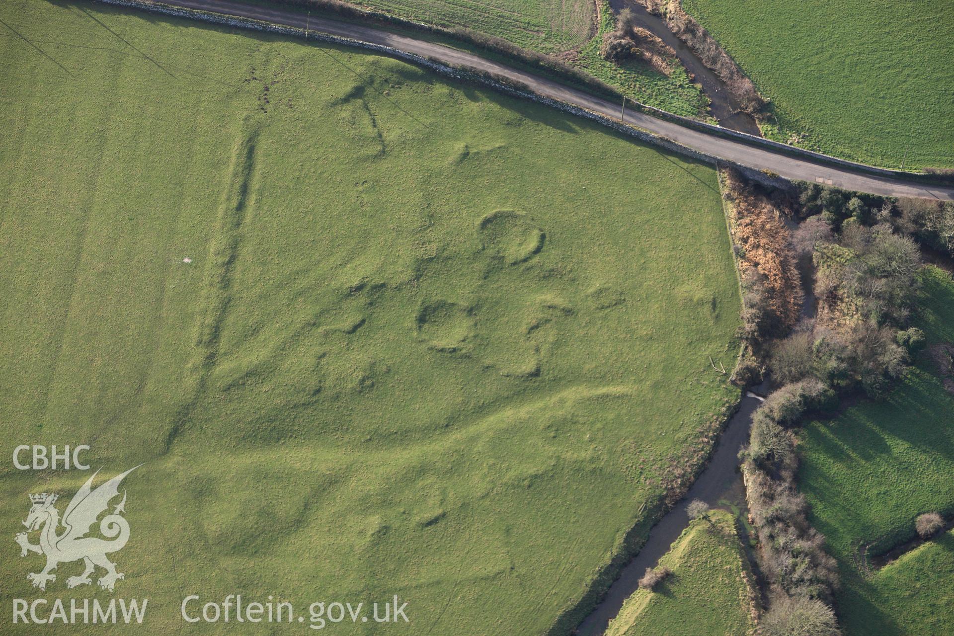 RCAHMW colour oblique photograph of Pont Sarn-las hut group, showing in low light. Taken by Toby Driver on 13/01/2012.