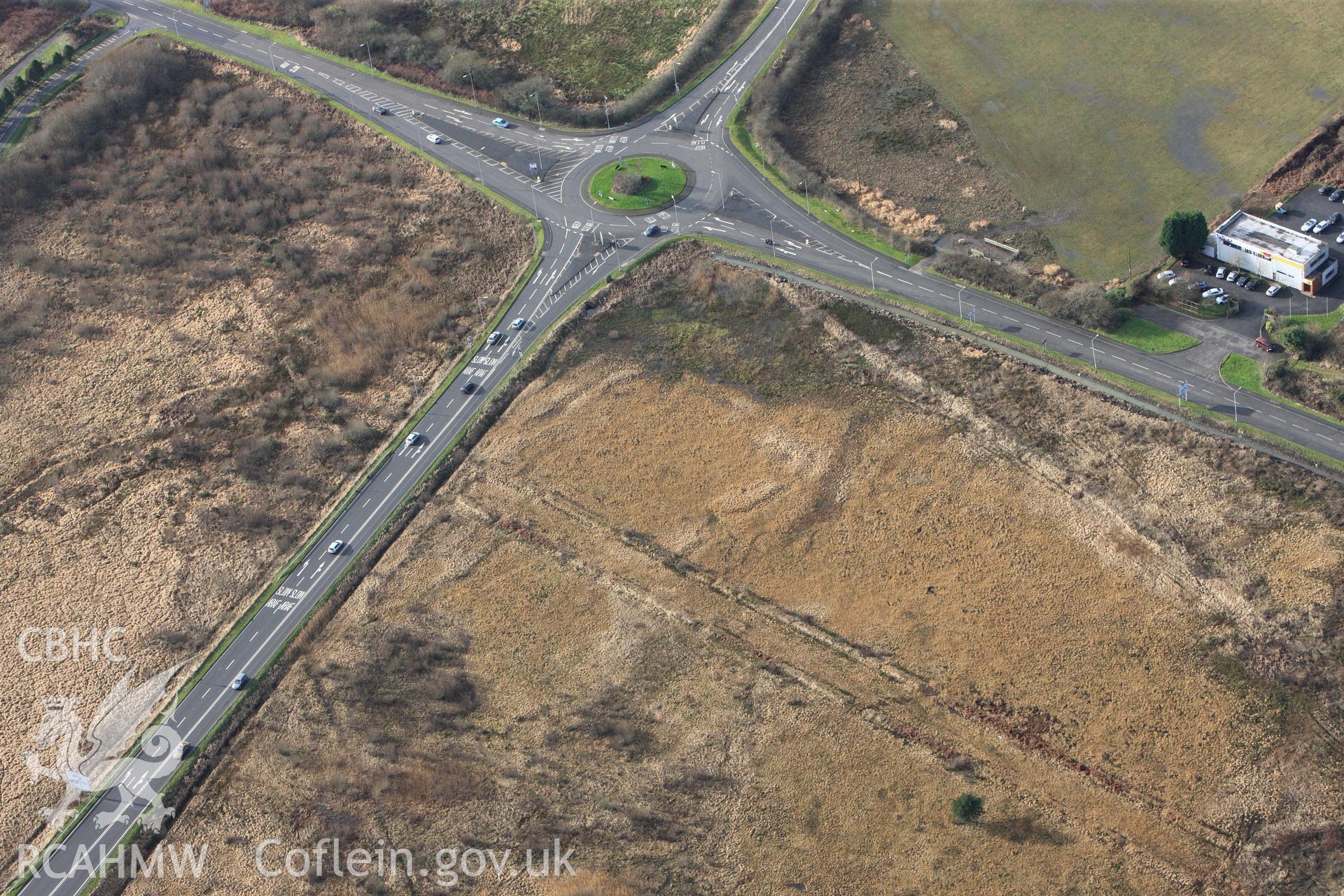 RCAHMW colour oblique photograph of Roman Military Enclosure on Stafford Common. Taken by Toby Driver on 27/01/2012.