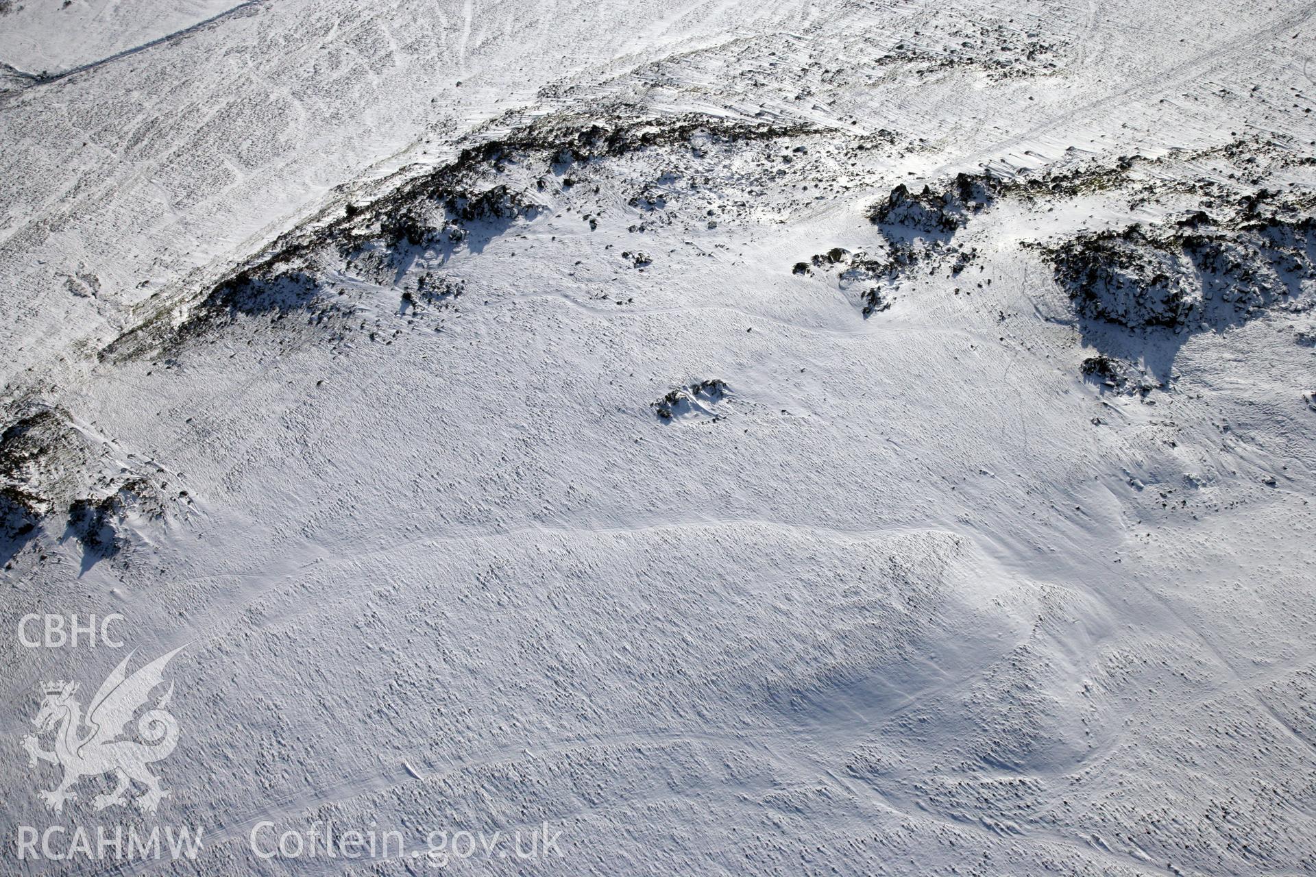 RCAHMW colour oblique photograph of Carn Meini Bluestone Outcrops of Spotted Dolerite. Taken by Toby Driver on 02/02/2012.