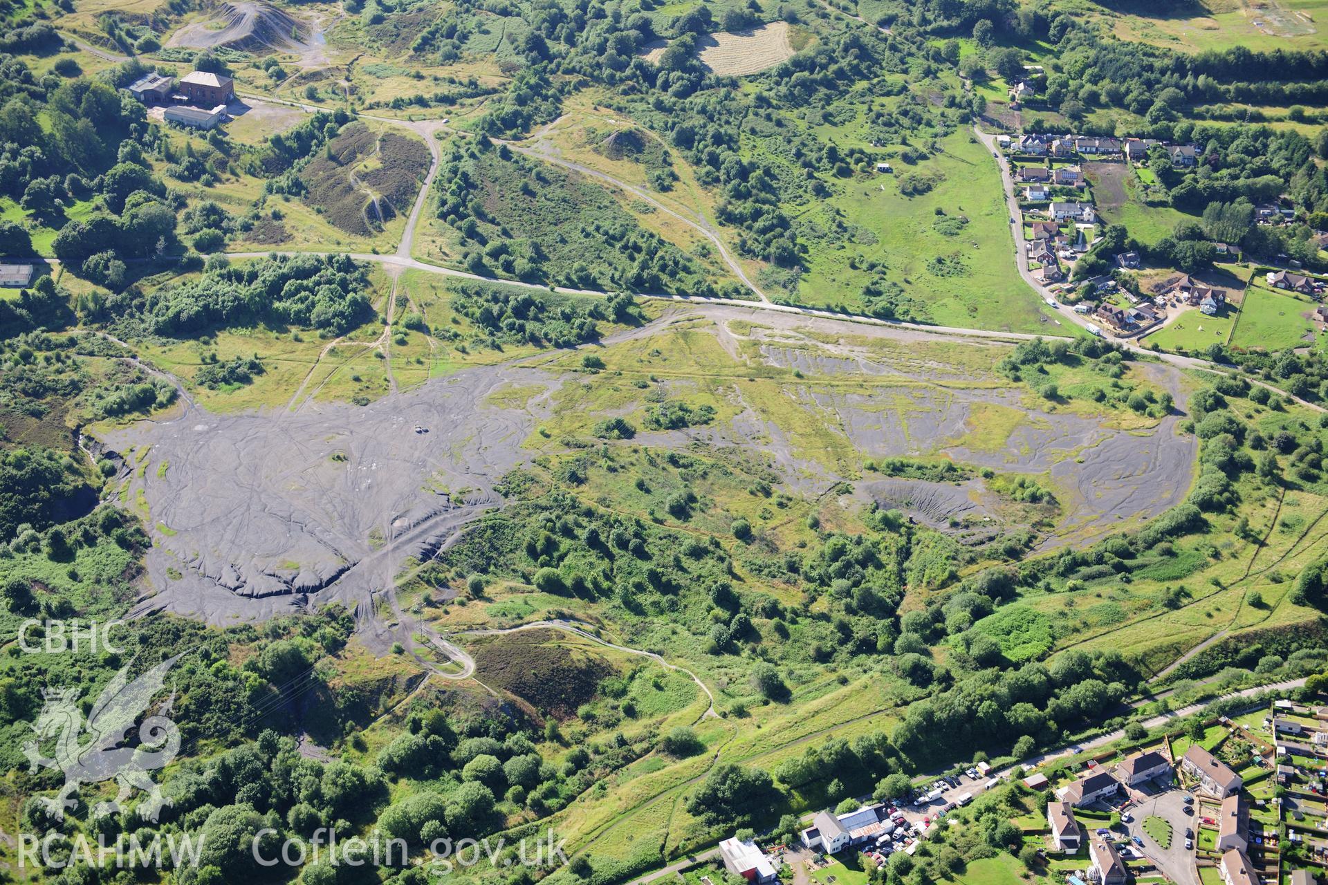 RCAHMW colour oblique photograph of British Ironworks, general view. Taken by Toby Driver on 24/07/2012.