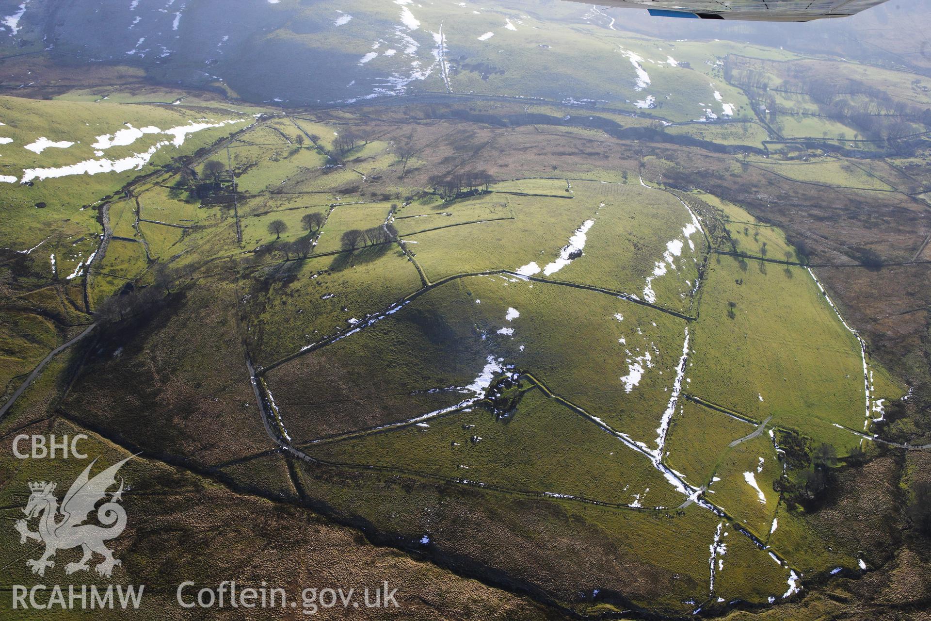 RCAHMW colour oblique photograph of Gwar Ffynnon, Deserted Famsteads. Taken by Toby Driver on 07/02/2012.