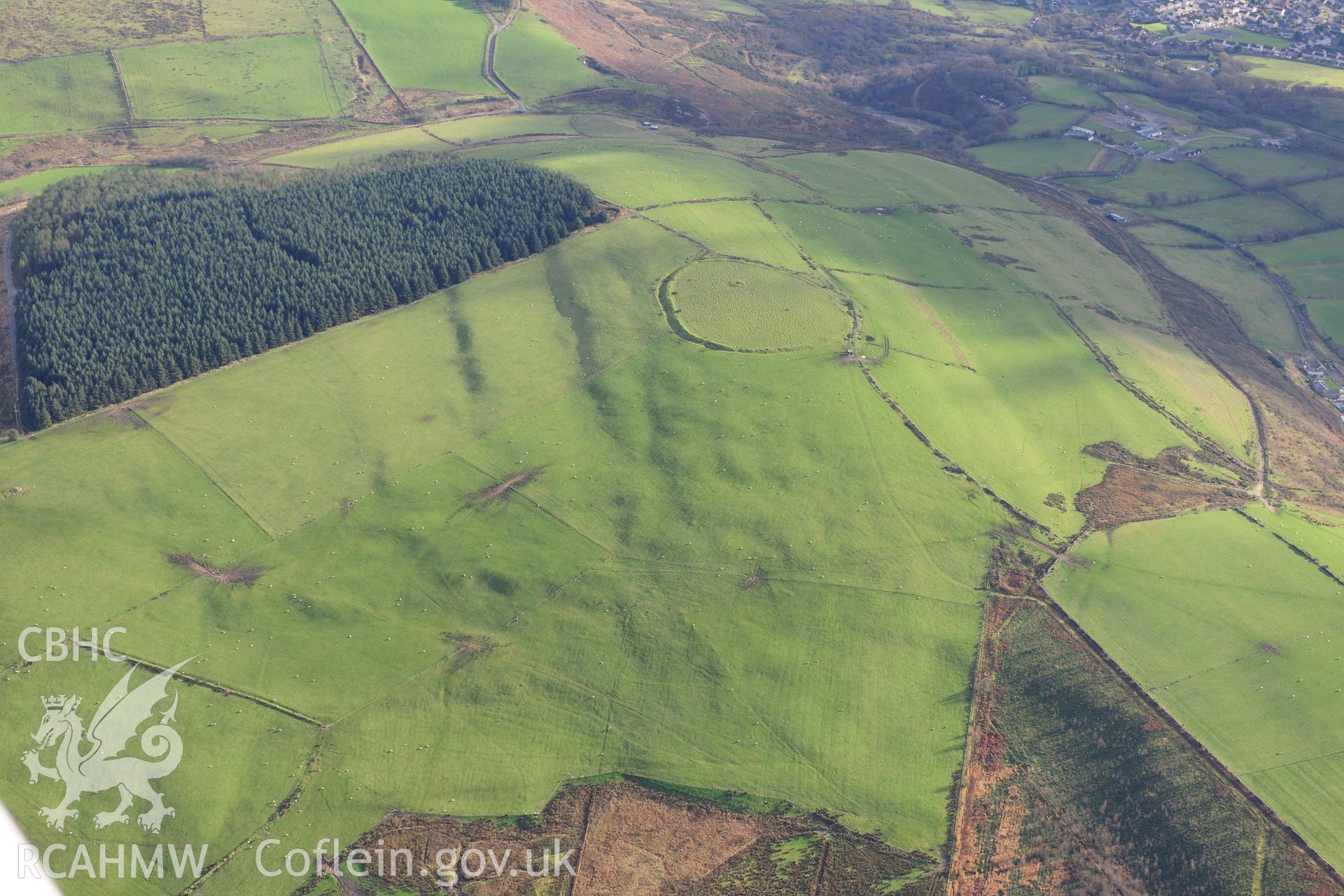 RCAHMW colour oblique photograph of Buarth y Gaer defended enclosure. Taken by Toby Driver on 28/11/2012.