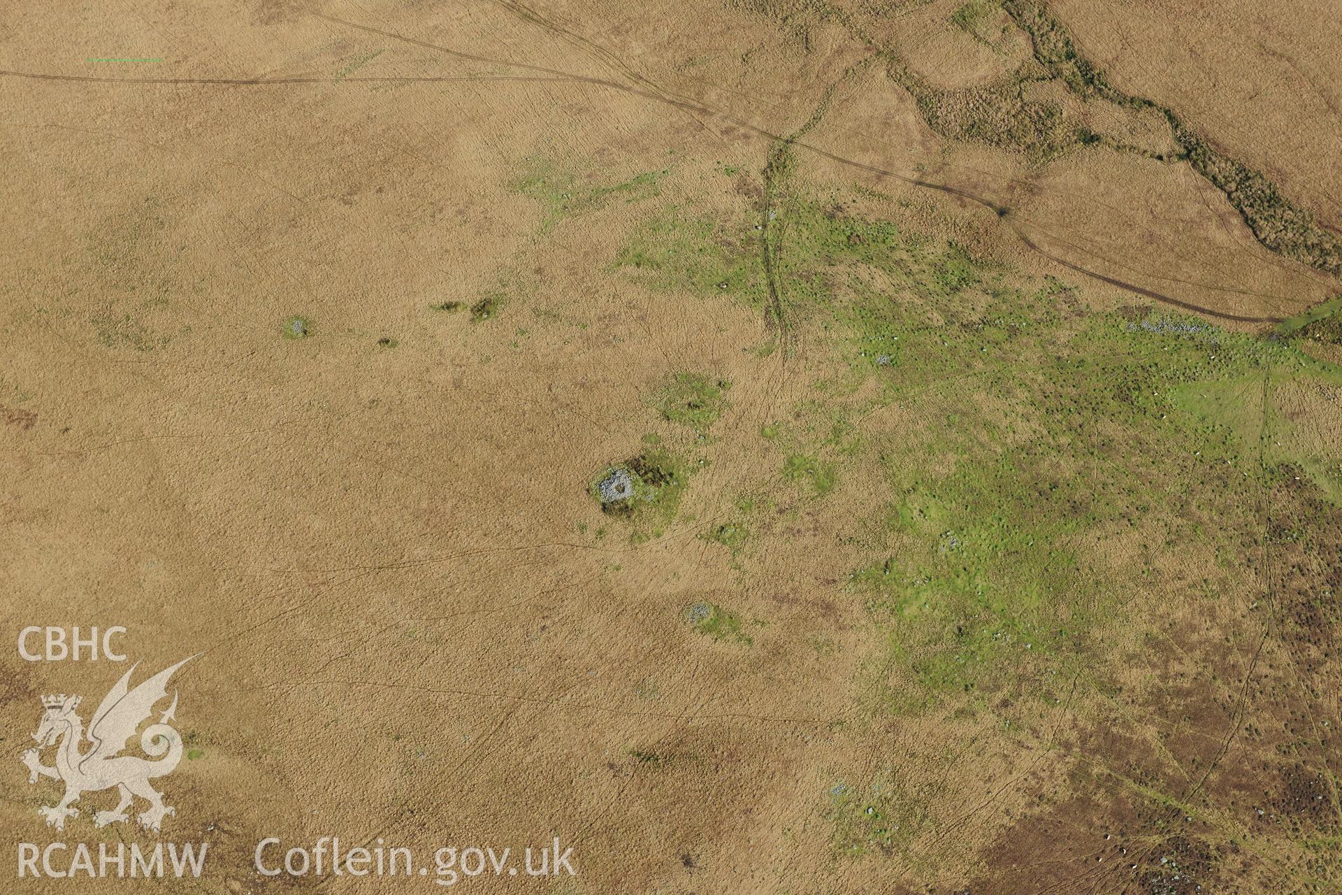 RCAHMW colour oblique photograph of Henrhyd Cairns. Taken by Toby Driver on 28/11/2012.