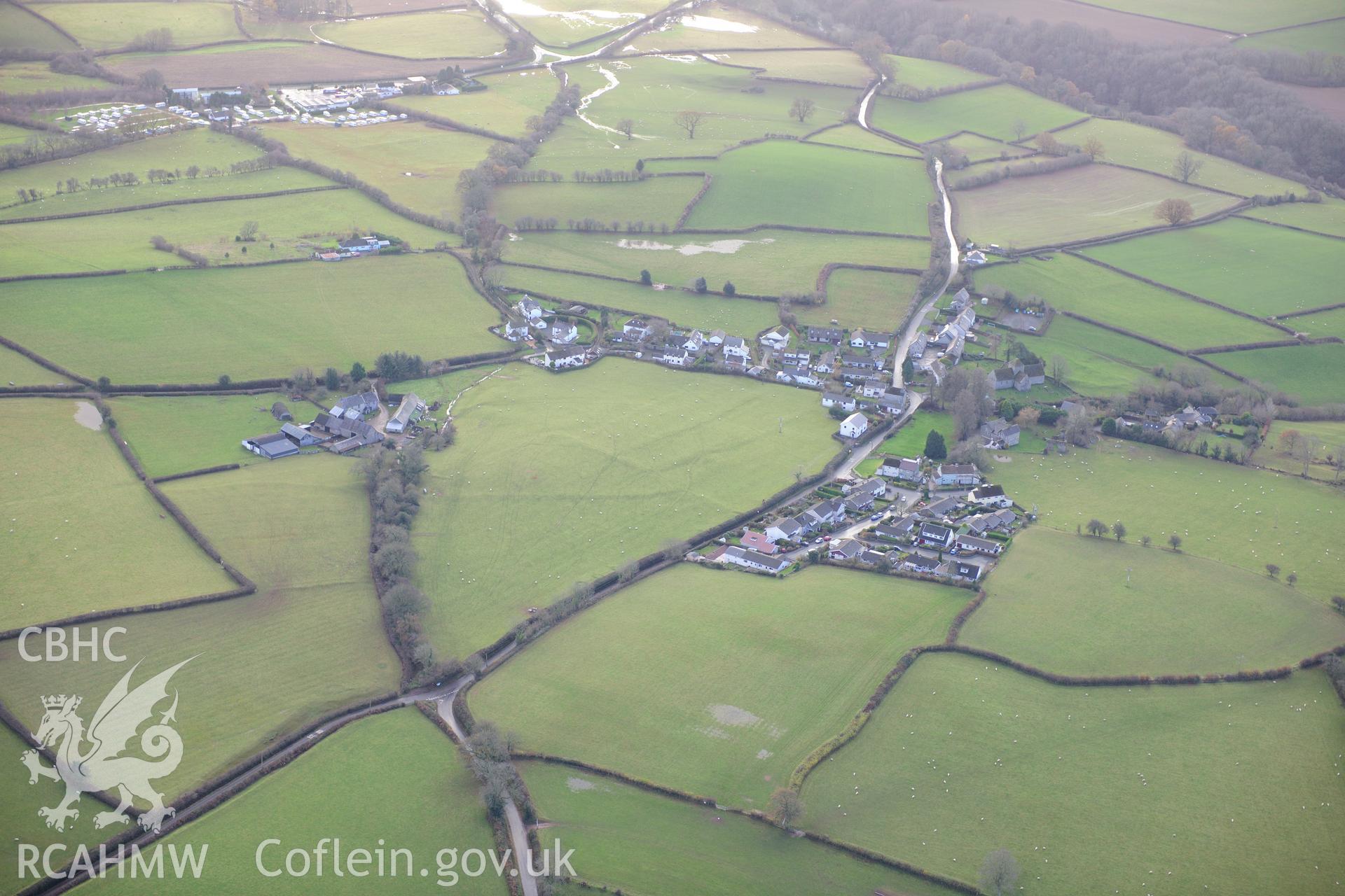 RCAHMW colour oblique photograph of Llanddew, with earthworks. Taken by Toby Driver on 23/11/2012.